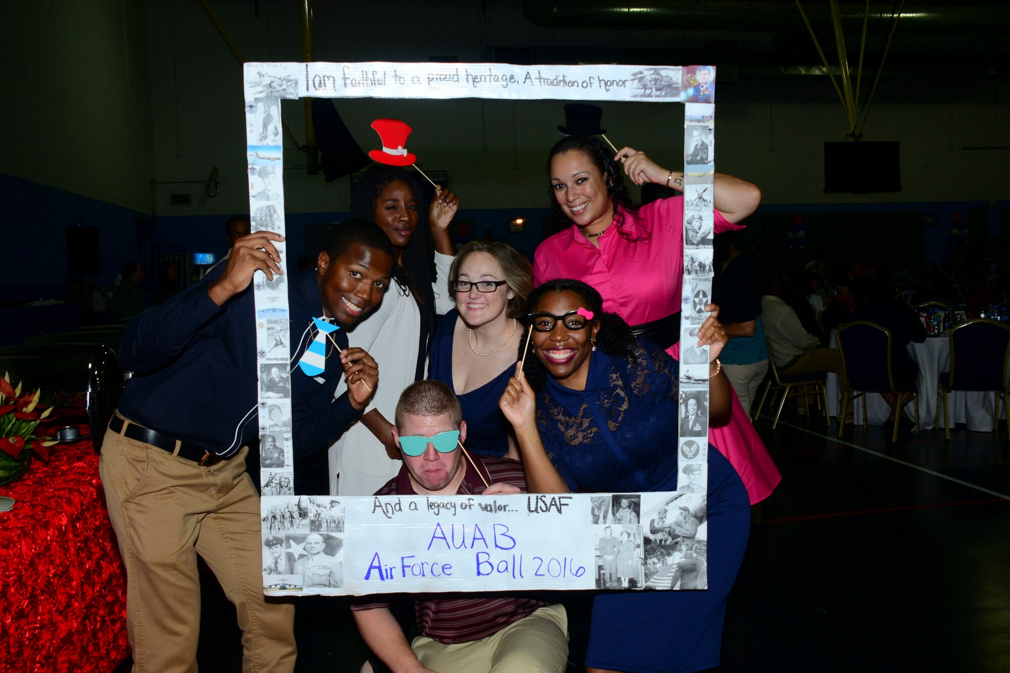 Members attending the inaugural Air Force Birthday Ball at Al Udeid Air Base, Qatar, pose for a group photo Sept. 23, 2016. More than 300 Grand Slam members celebrated the 69th Air Force birthday together at the ball before joining other AUAB members at Memorial Plaza for the Air Force Birthday Ball after-party.(U.S. Air Force photo/Staff Sgt. Jayson Santoyo/Released)