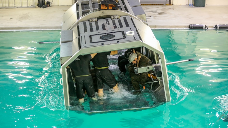 Marines get dunked in a simulated helicopter crash during a training exercise at Marine Corps Base Camp Lejeune, N.C., Sept. 26, 2016. The Modular Amphibious Egress Training, also known as the Helo Dunker, teaches Marines survival techniques to use if a helicopter lands in the water. The Marines conducting the training are with 2nd Light Armored Reconnaissance Battalion. 