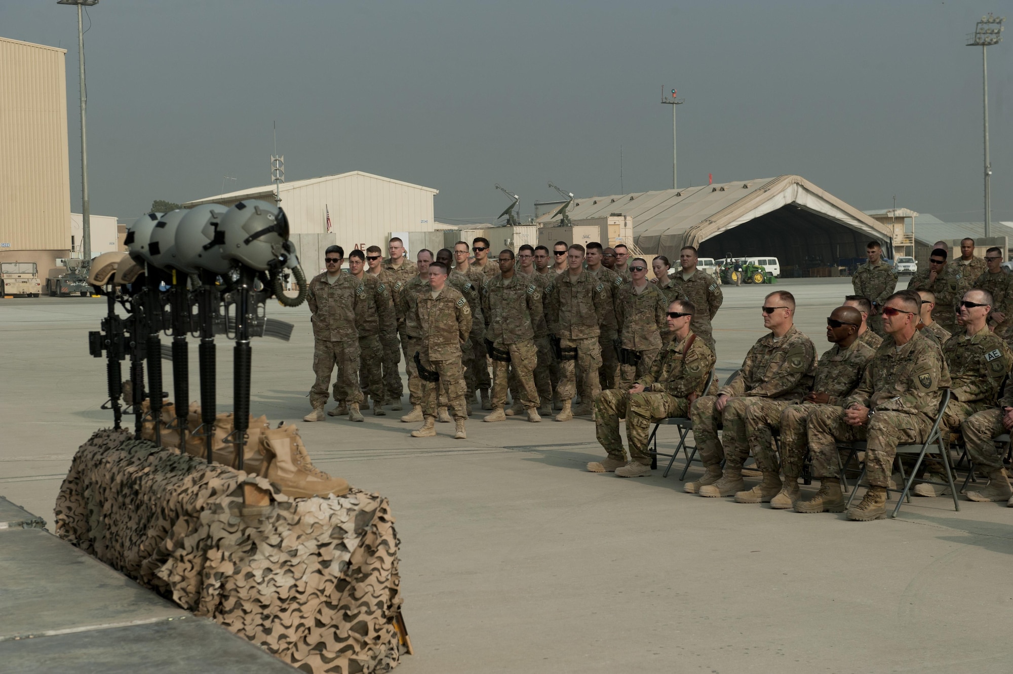 Airmen from the 455th Expeditionary Security Forces Squadron gather in a formation during the TORQE 62 remembrance ceremony, Bagram Airfield, Afghanistan, Oct. 2, 2016. Two Fly Away Security Team Airmen were lost when Torque 62 crashed during takeoff at Jalalabad Airfield, Afghanistan on Oct. 2, 2015. (U.S. Air Force photo by Capt. Korey Fratini)