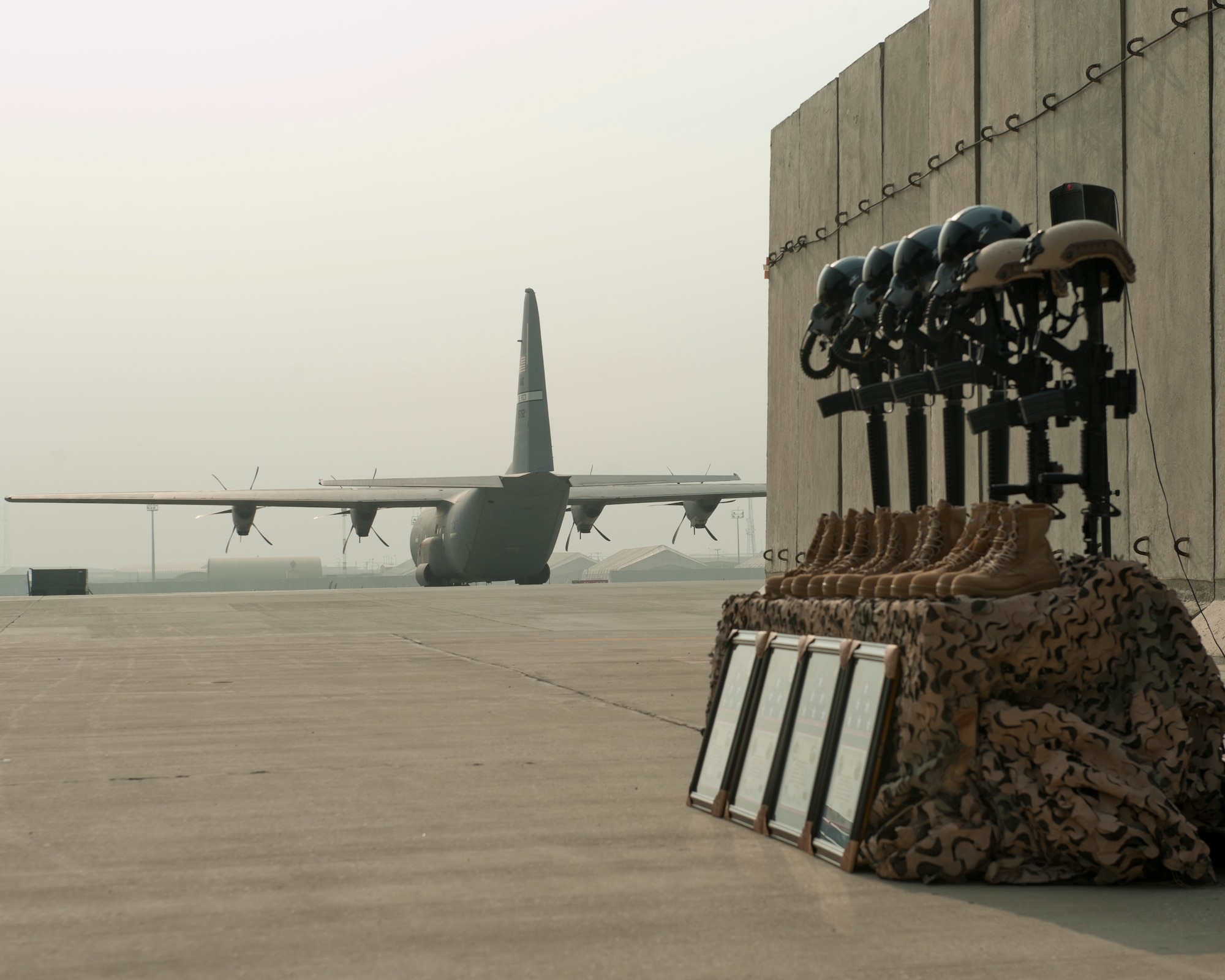 Battlefield crosses were placed in honor of the six Airmen lost when TORQE 62 crashed one year ago during a remembrance ceremony, Bagram Airfield, Afghanistan, Oct. 2, 2016. Airmen from across Bagram came to honor those who paid the ultimate sacrifice. (U.S. Air Force photo by Capt. Korey Fratini)