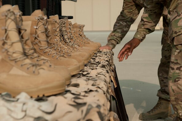 Airmen from across the 455th Air Expeditionary Wing gathered to remember the lives lost during the TORQE 62 remembrance ceremony, Bagram Airfield, Afghanistan, Oct. 2, 2016. On Oct. 2, 2015 TORQE 62 crashed during takeoff at Jalalabad Airfield, Afghanistan resulting in six Airmen losing their lives. (U.S. Air Force photo by Capt. Korey Fratini)