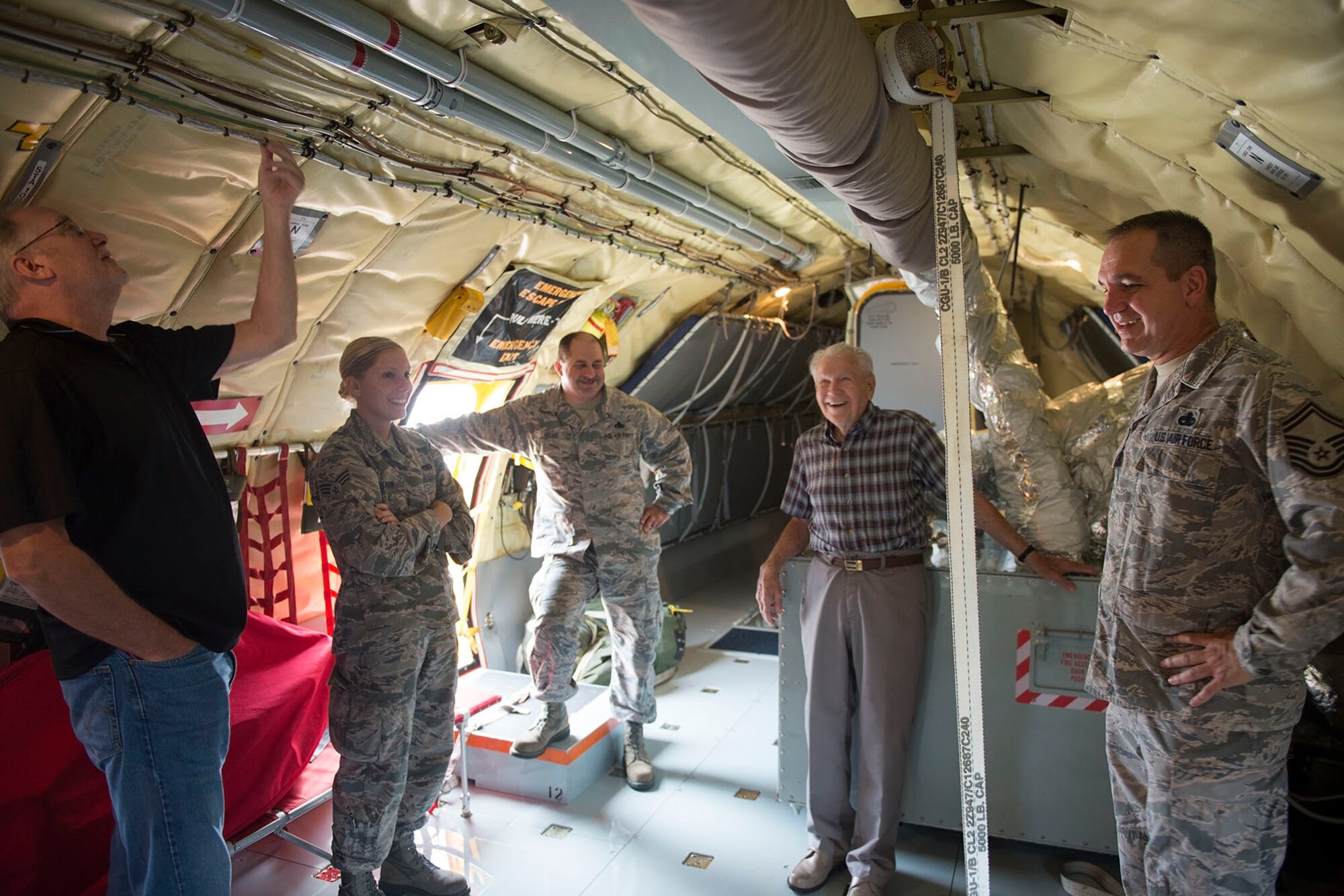 Pictured from left to right, Richard Hyman Jr., Senior Airman Jaclyn Hyman, 434th Aircraft Maintenance Squadron crew chief, Master Sgt. Daniel Helms, 434th Maintenance Squadron crew chief, (Ret.) Lt. Col. Richard Hyman and Senior Master Sgt. Charles Hoover, 434th Maintenance Squadron flight chief, take in the sights of a KC-135R Stratotanker here during a visit Aug. 17th, 2016. Richard, a WWII and Korean War veteran, served at what was then known, Bunker Hill Air Force Base, Ind., until he retired in 1965. (U.S. Air Force photo/Staff Sgt. Jami K. Lancette)