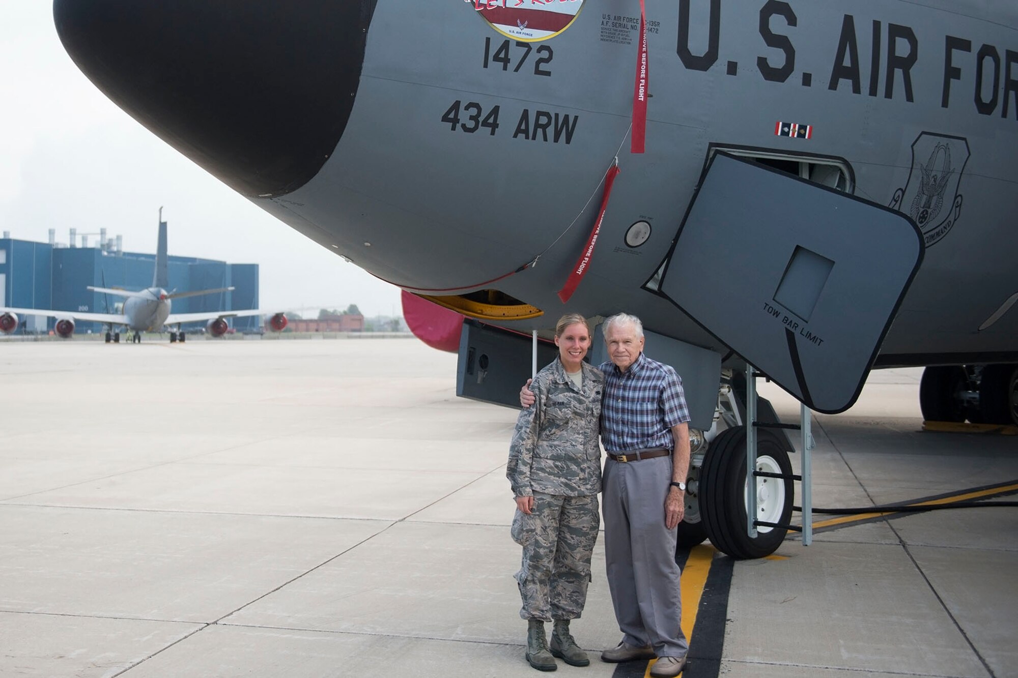 (Ret.) Lt. Col. Richard Hyman senior and Senior Airman Jaclyn Hyman, 434th Aircraft Maintenance Squadron crew chief, pose in front of a KC-135R Stratotanker here during a visit Aug. 17th, 2016. Richard, a WWII and Korean War veteran, served at what was then known, Bunker Hill Air Force Base, Ind., until he retired in 1965. (U.S. Air Force photo/Staff Sgt. Jami K. Lancette)