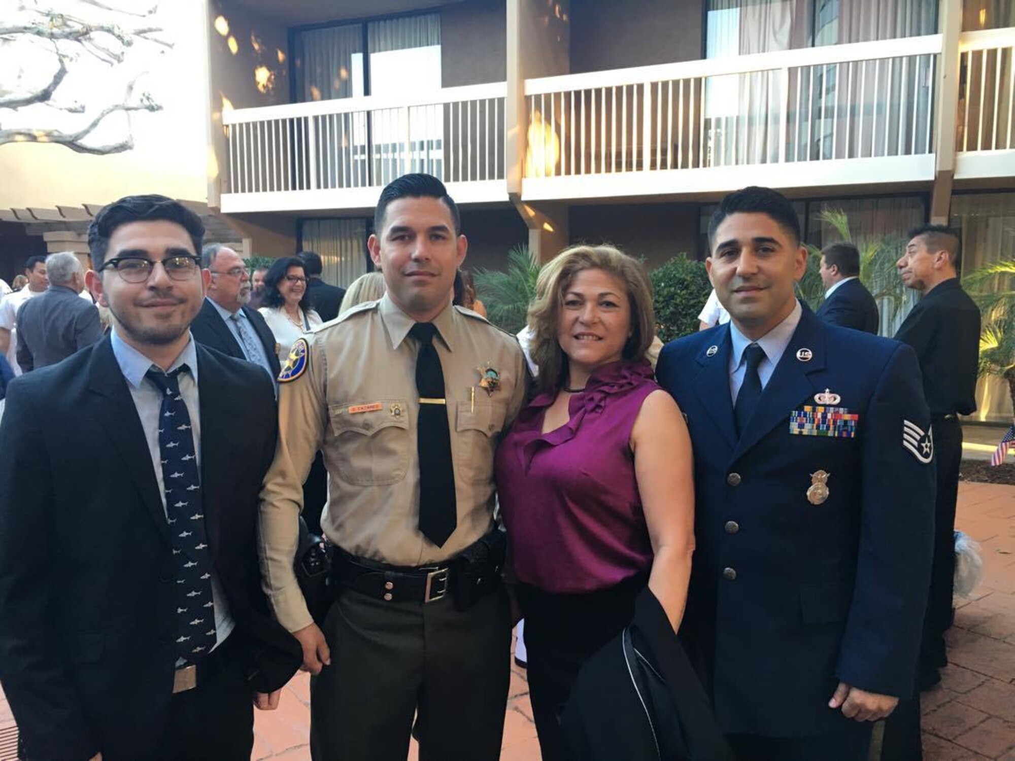 Staff Sgt. Jesus Cazares, 146th Airlift Wing unit training manager, and service members from other services were recognized at the Oxnard Chamber of Commerce Annual Military Appreciation Dinner, September 30. Cazares, who was born and raised in Oxnard shared this special moment with his mom, two brothers and fiancé. (Courtesy Photo)
