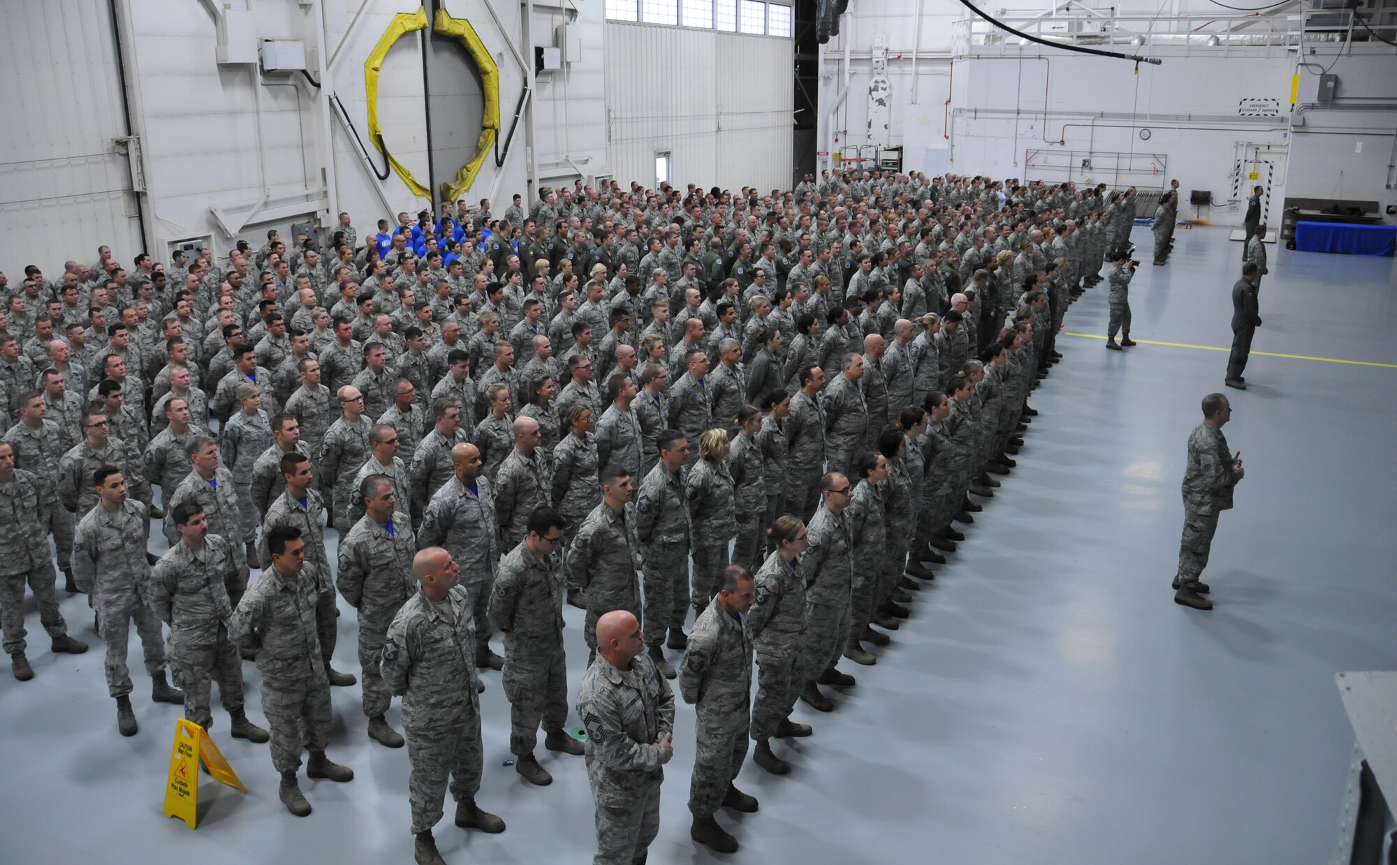 Airmen of the 128th Air Refueling Wing stand at attention as Major General Donald P. Dunbar, Adjutant General of the Wisconsin National Guard, presents the Air Force Outstanding Unit Award to Col. Daniel Yenchesky, commander of the 128 ARW in a formal ceremony Oct. 2, 2016 at General Mitchell Airfield, Milwaukee. This award marks the seventh time the 128 ARW has received the AFOUA and covers the period of Oct. 1, 2014 through Sept. 30, 2015.  (Air National Guard photo by Senior Airman Morgan R. Lipinski, 128 ARW Public Affairs/Released)