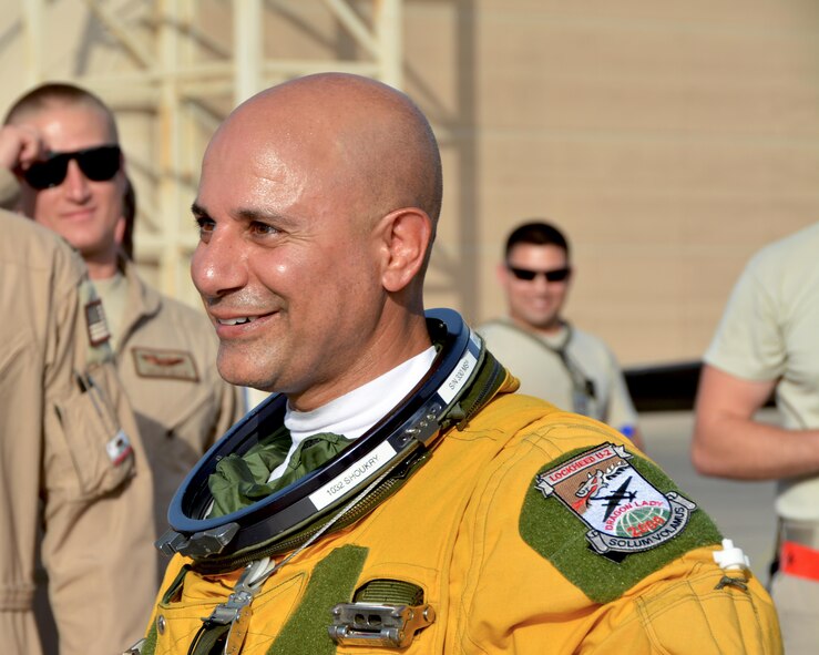 Lt. Col. Ralph, 99th Expeditionary Reconnaissance Squadron U2 pilot, smiles after exiting the cockpit of a U2 in an undisclosed location, Sep. 10, 2016. Ralph  attained 2,000 flying hours during his flight, which is a career milestone only 34 other U2 pilots have ever accomplished. (U.S. Air Force photo by Staff Sgt. Samantha Mathison.)