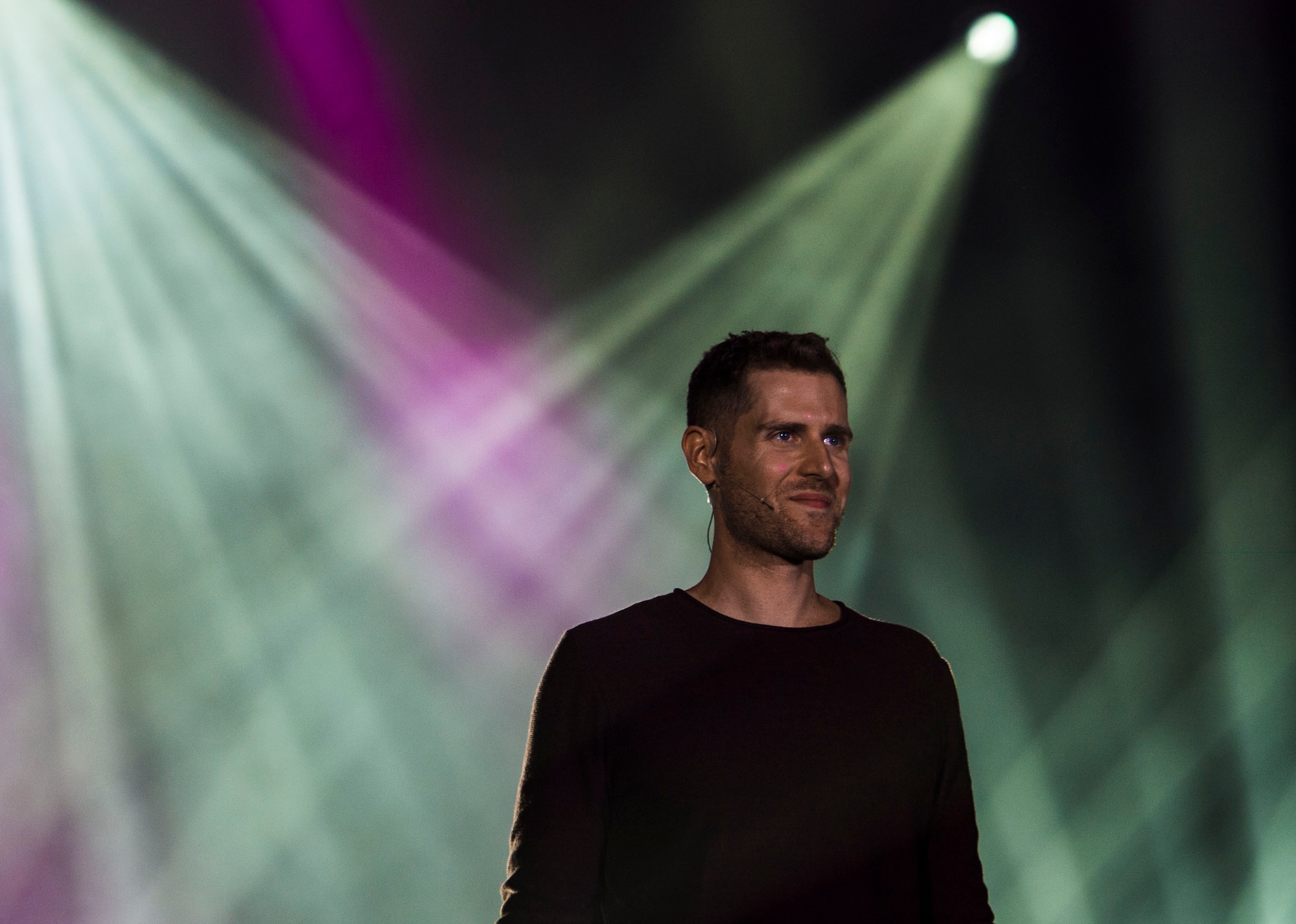 Rob Lake, a magician, performs a free magic  show for U.S. Department of Defense members, their families and authorized guests at Ramstein Air Base, Germany, Sept. 28, 2016. Lake’s performance was part of a tour conducted in coordination with Armed Forces Entertainment. (U.S. Air Force photo/ Airman 1st Class Joshua Magbanua)