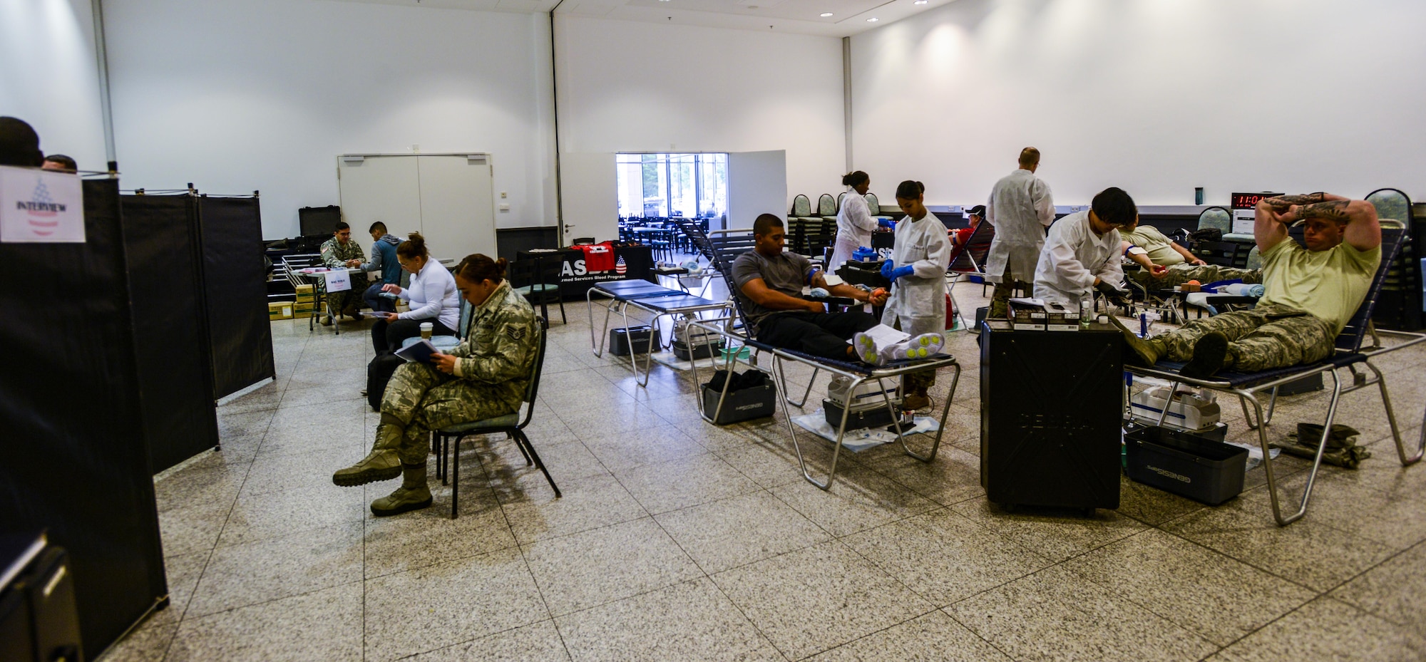 U.S. service members and civilians donate blood during a blood drive at the Kaiserslautern Military Community Center, Sept. 20, 2016. The Armed Services Blood Program-Europe hosted the blood drive to collect donations meant to go directly to service members and their families. (U.S. Air Force photo by Staff Sgt. Timothy Moore)