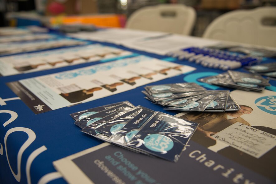 Pamphlets of charitable donation information rest on display during the Combined Federal Campaign 2016 kickoff at Osan Air Base, Republic of Korea, Oct. 3, 2016. Over a period of nine weeks, members of Team Osan have the chance to contribute to various charities. (U.S. Air Force photo by Senior Airman Dillian Bamman)