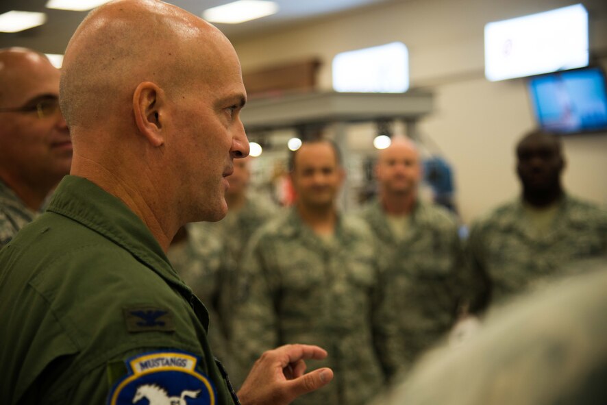 U.S. Air Force Col. Andrew Hansen, speaks with volunteer donation representatives during the Combined Federal Campaign 2016 kickoff at Osan Air Base, Republic of Korea. Over a period of nine weeks, members of Team Osan have the chance to contribute to various charities even from an overseas location. (U.S. Air Force photo by Senior Airman Dillian Bamman)