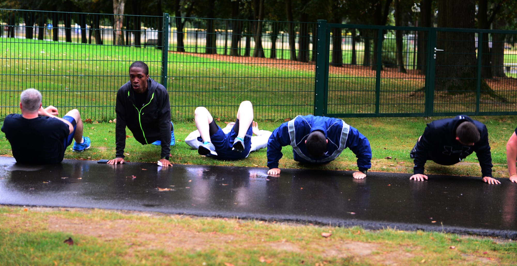 Airmen from the 52nd Fighter Wing compete in a physical challenge as part of The Amazing Be Ready Race recognizing National Preparedness Month at Spangdahlem Air Base, Germany, Sept. 30, 2016. The race consisted of several stations challenging Airmen on their knowledge and readiness for emergency response and preparedness. (U.S. Air Force photo by Senior Airman Joshua R. M. Dewberry)