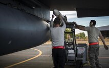 A three-man weapons load crew team, from the 48th Aircraft Maintenance Squadron, load an AIM-120 onto an F-15E Strike Eagle after a sortie in support of Tactical Leadership Programme 16-3 at Los Llanos Air Base, Spain, Sept. 19. The training prepares NATO and allied forces’ flight leaders to serve as mission commanders, lead coalition force air strike packages, and provide tactical air expertise to NATO agencies. (U.S. Air Force photo/ Staff Sgt. Emerson Nuñez)