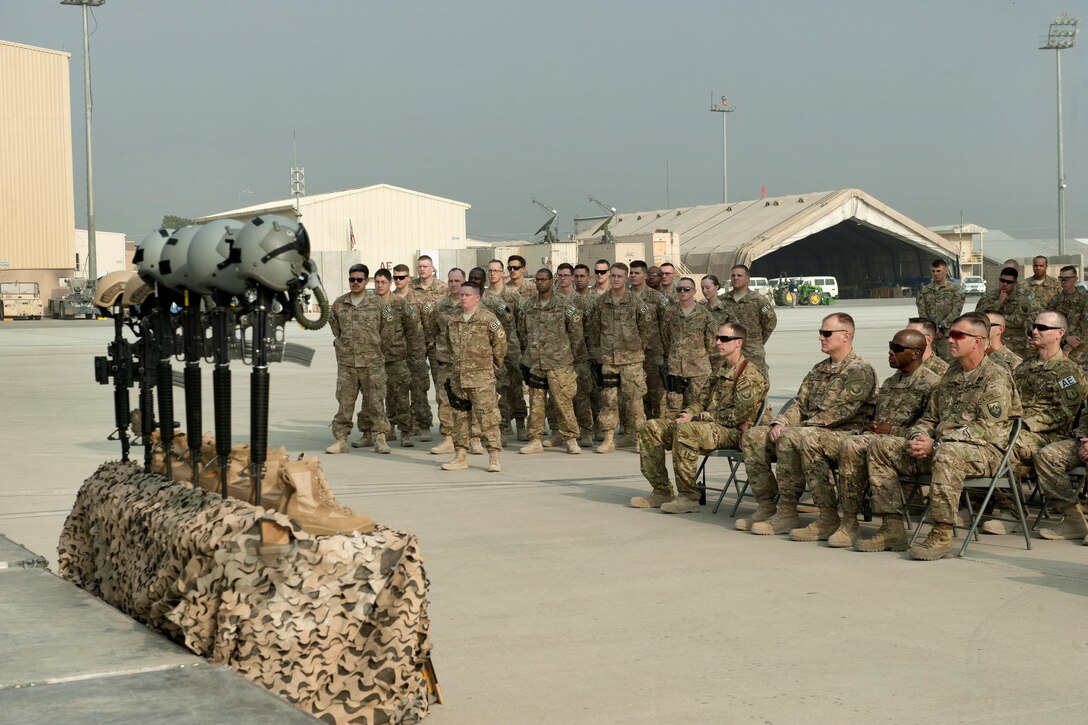 Airmen get in formation during the TORQE 62 remembrance ceremony at Bagram Airfield, Afghanistan, Oct. 2, 2016. Air Force photo by Capt. Korey Fratini