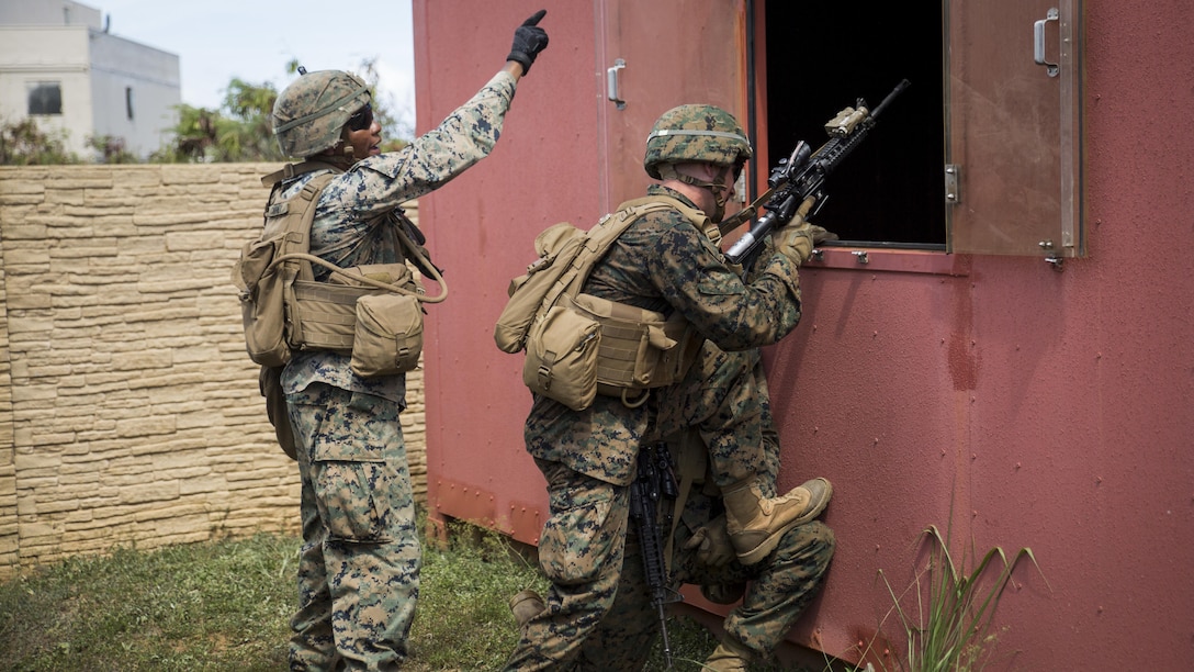 Marines from Alpha Company, 1st Battalion, 3rd Marine Regiment, practice clearing buildings during Exercise Island Viper at Marine Corps Base Hawaii, Sept. 27, 2016. Marines wrap up their final week of Exercise Island Viper, an annual pre-deployment training event preparing Marines for a larger exercise in the Pacific Region. During Exercise Island Viper, the Marines practiced clearing buildings, patrolling through simulated villages, solved obstacles at the Leadership Reaction Course and traversing through an Improvising Explosive Devices course.