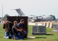 Volunteers act as adversaries preparing to ambush the flightline during training at Whiteman Air Force Base, Mo., Sept. 20, 2016. The scenario tested the 509th Security Forces Squadron response to a hostile force attempting to destroy Air Force resources. (U.S. Air Force photo by Senior Airman Danielle Quilla) 