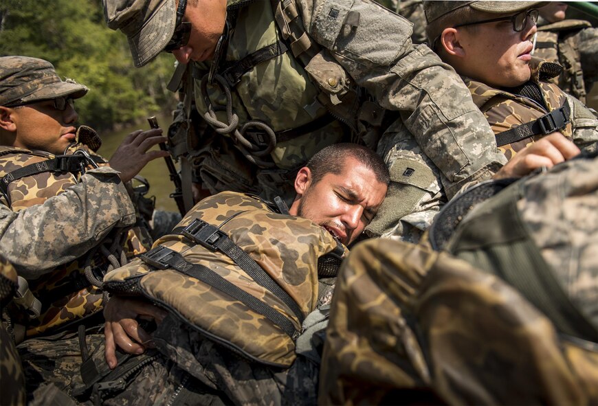 A simulated victim yells as he is helped by a 6th Ranger Training Battalion Soldier during a mass casualty exercise Sept. 28 at Eglin Air Force Base, Fla.  Three groups of Soldiers in zodiac boats encountered a simulated civilian and Army boat crash.  The Soldiers acted as first responders to triage the victims, coordinate to receive help and get the wounded to local emergency technicians.  (U.S. Air Force photo/Samuel King Jr.)