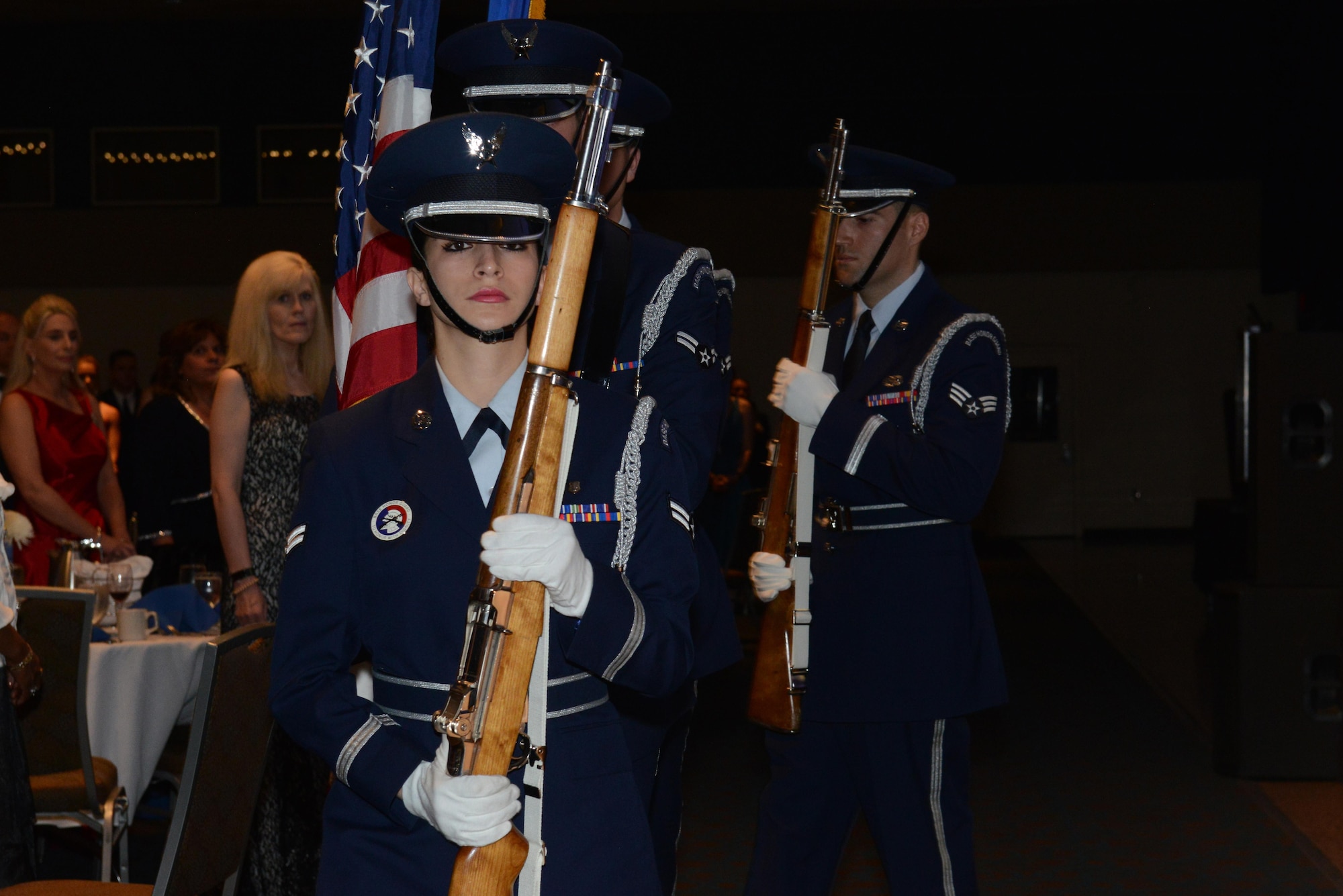 Airman 1st Class Tesla Saiz, Joint Base Elmendorf-Richardson honor guard, leads the Presentation of Colors during the 2016 Joint Base Elmendorf-Richardson Air Force Ball at the Anchorage Egan Center, Alaska, Sept. 24, 2016. This event marked the Air Force’s 69th birthday celebrating the Air Force’s heritage through reflection, ceremony and camaraderie.