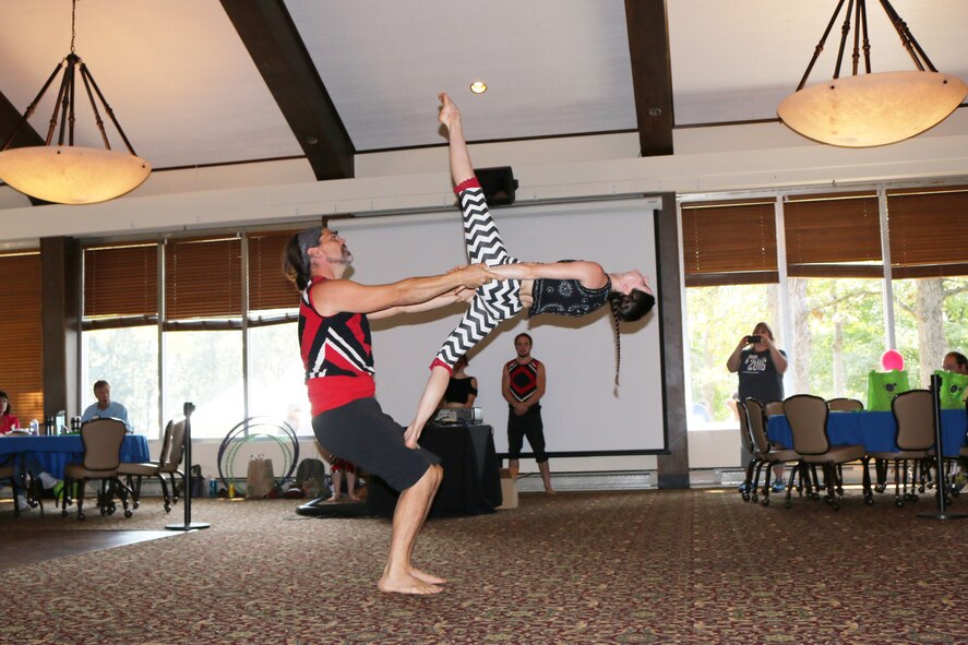 The Clan Destiny Circus preform acrobatics at the Arnold Lakeside Club for the Air Force’s 69th birthday celebration. (U.S. Air Force photos/Holly Peterson)