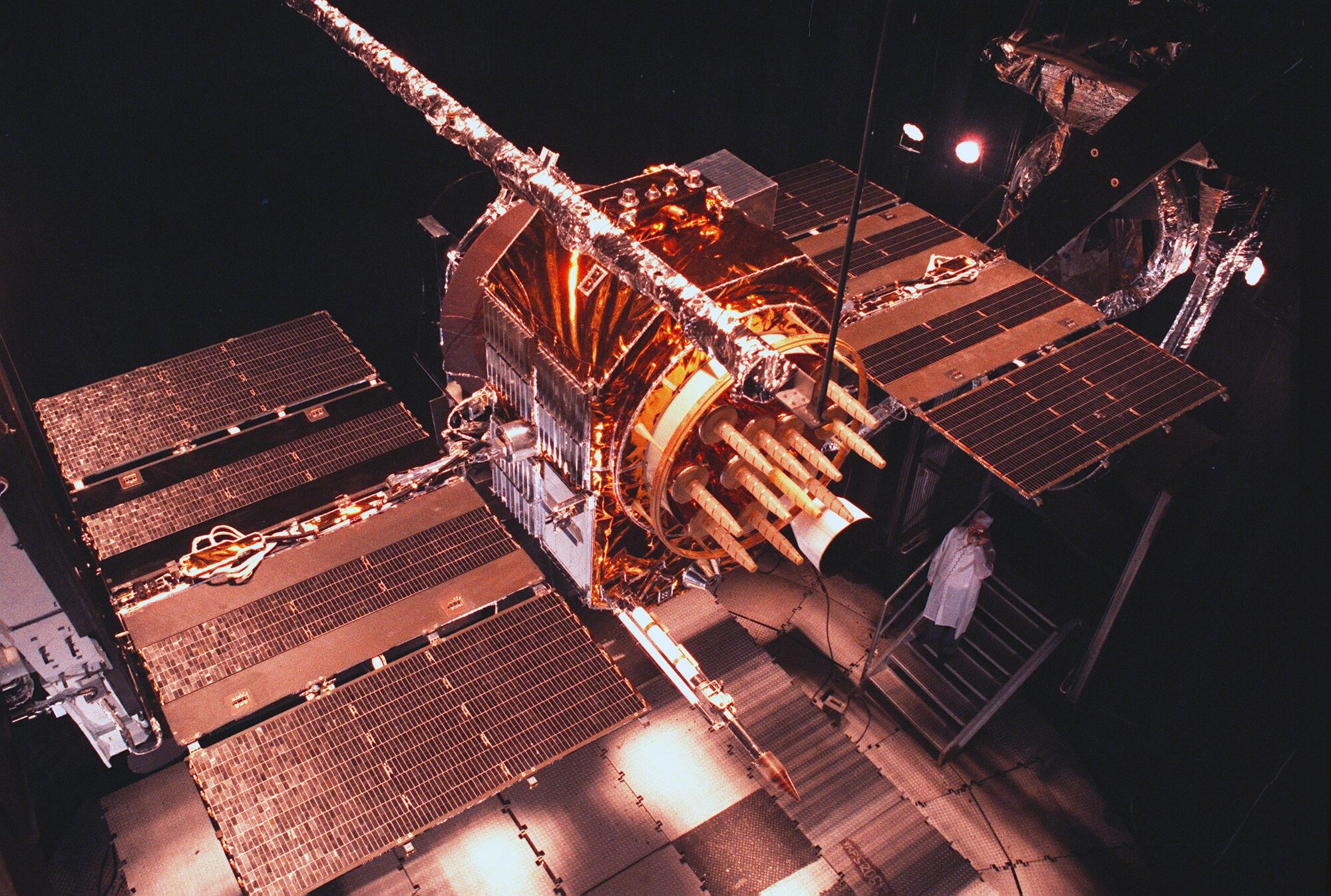 The Global Positioning System Block II satellite pictured here in 1985 underwent a four-month series of qualification tests in the AEDC Mark I Space Chamber to determine whether the satellite could withstand extreme heat and cold in space. The first GPS Block I satellite was also tested at AEDC in 1977 the same year of the first operational launch. The GPS is a U.S.-owned utility that provides users with positioning, navigation and timing services. The system consists of three segments: the space segment, the control segment and the user segment. The U.S. Air Force develops, maintains and operates the space and control segments. There are currently 31 GPS satellites in operation and the latest version in use are 12 GPS Block IIF. (AEDC file photo)