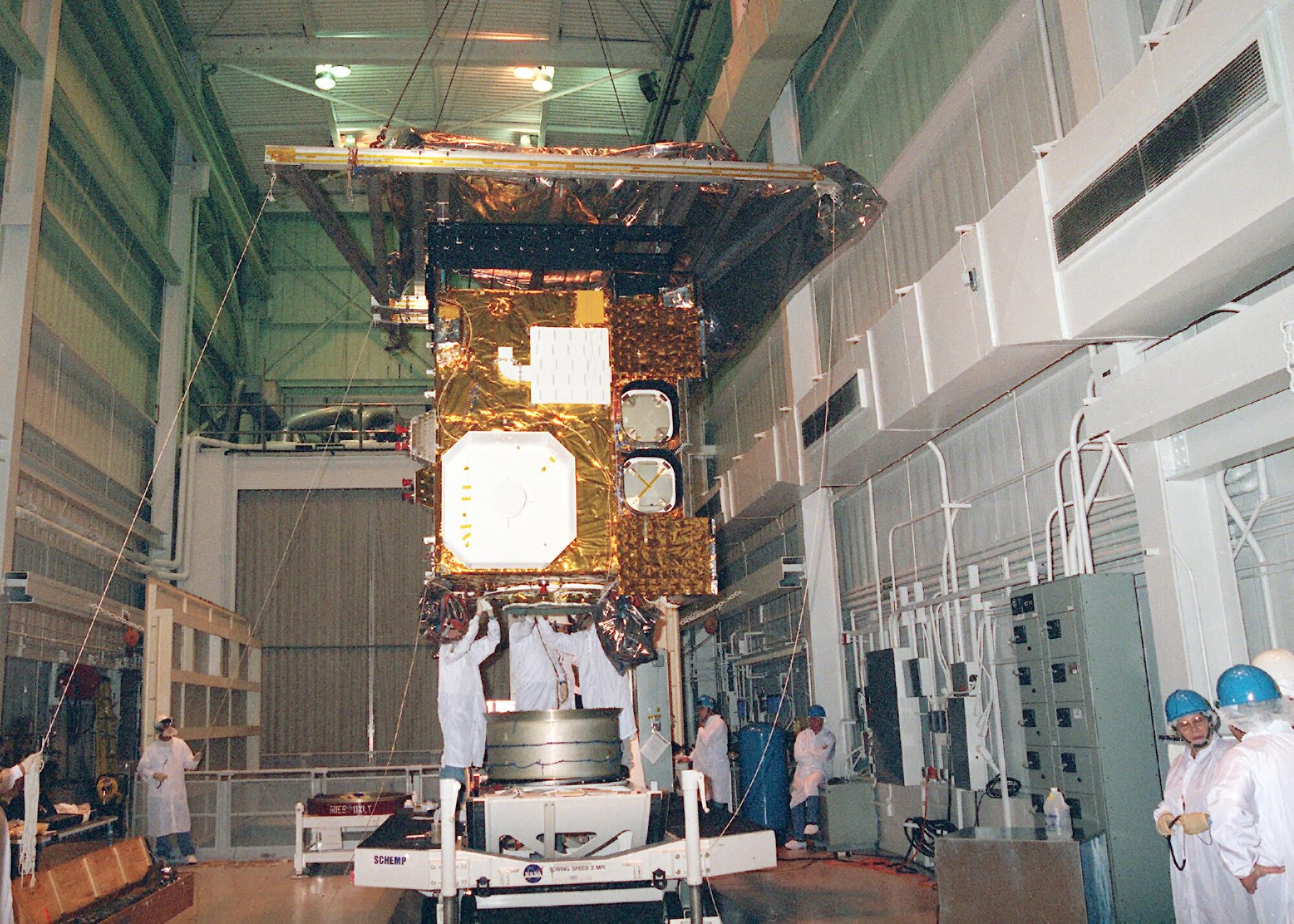 Pictured here is the Geostationary Operational Environmental Satellite-M (GOES-M) weather satellite in 2000 after testing in the AEDC Mark 1 Space Chamber. (AEDC file photo)