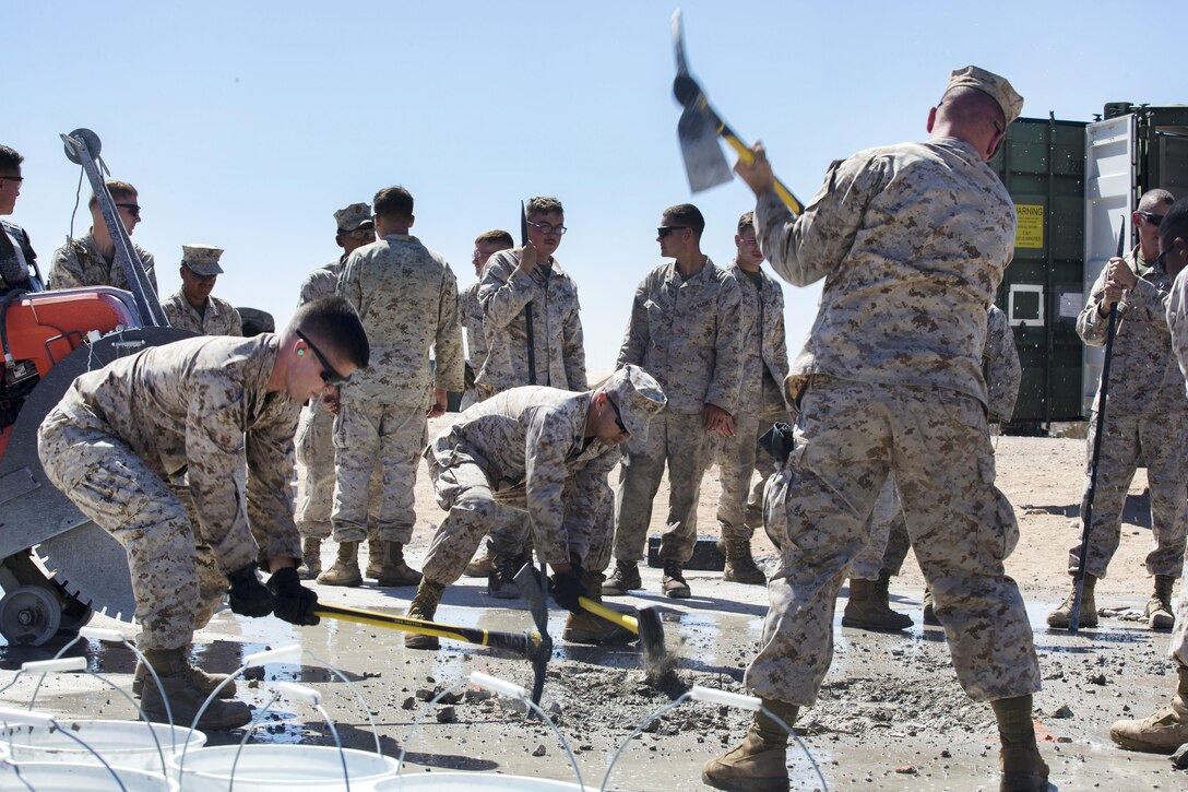 Marines participate in an airfield damage repair practical application exercise at Cannon Air Defense Complex Yuma, Ariz., Sept. 24, 2016. Marine Corps photo by Lance Cpl. Andrew M. Huff