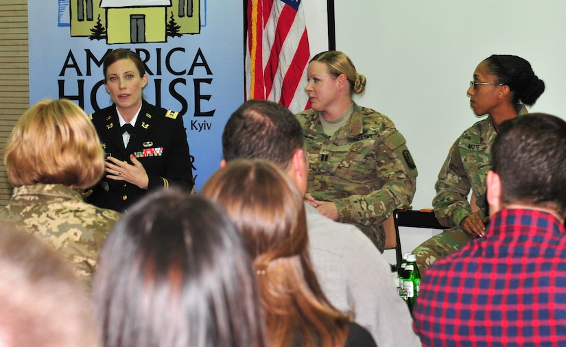 Maj. Katrina Self, a lawyer in the U.S. Army Reserve and a professional associate in public affairs at the U.S. Embassy in Kyiv, spoke about the honors and obstacles of being a woman serving in the military, Sept. 29, at the America House in Kyiv. Self was the moderator of the event and, along with four other women service members from the U.S. and Ukraine spoke about their trials, tribulations and successful moments during their time in the military. (Photo by Army Staff Sgt. Elizabeth Tarr)