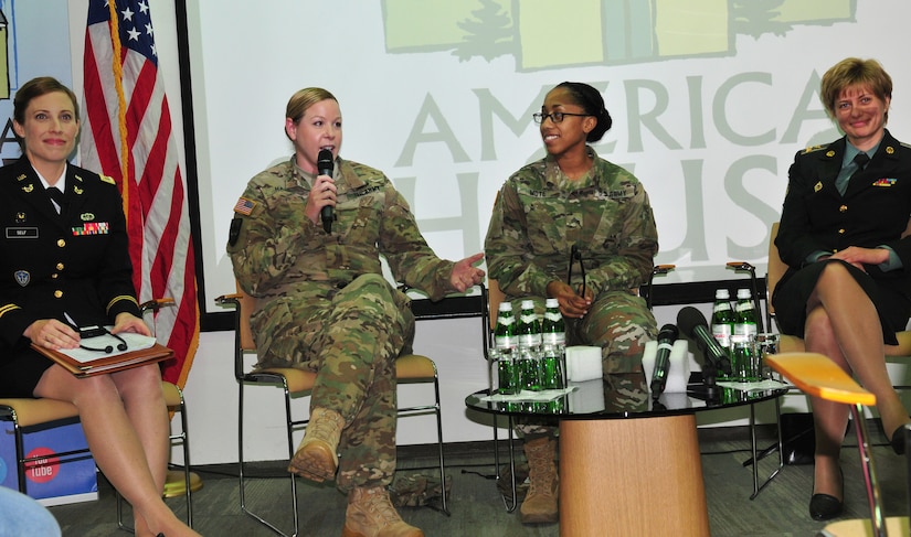 Capt. Cassandra Harris, the personnel officer for the Joint Multinational Training Group-Ukraine at the International Peacekeeping and Security Center spoke about the honors and obstacles of being a woman serving in the military, Sept. 29, at the American House in Kyiv. Building strong relationships and engaging with the local community here is just one aspect of the JMTG-U mission in Ukraine. Their primary goal is to build a sustainable and enduring training capacity within the Ukrainian land forces. (Photo by Army Staff Sgt. Elizabeth Tarr)