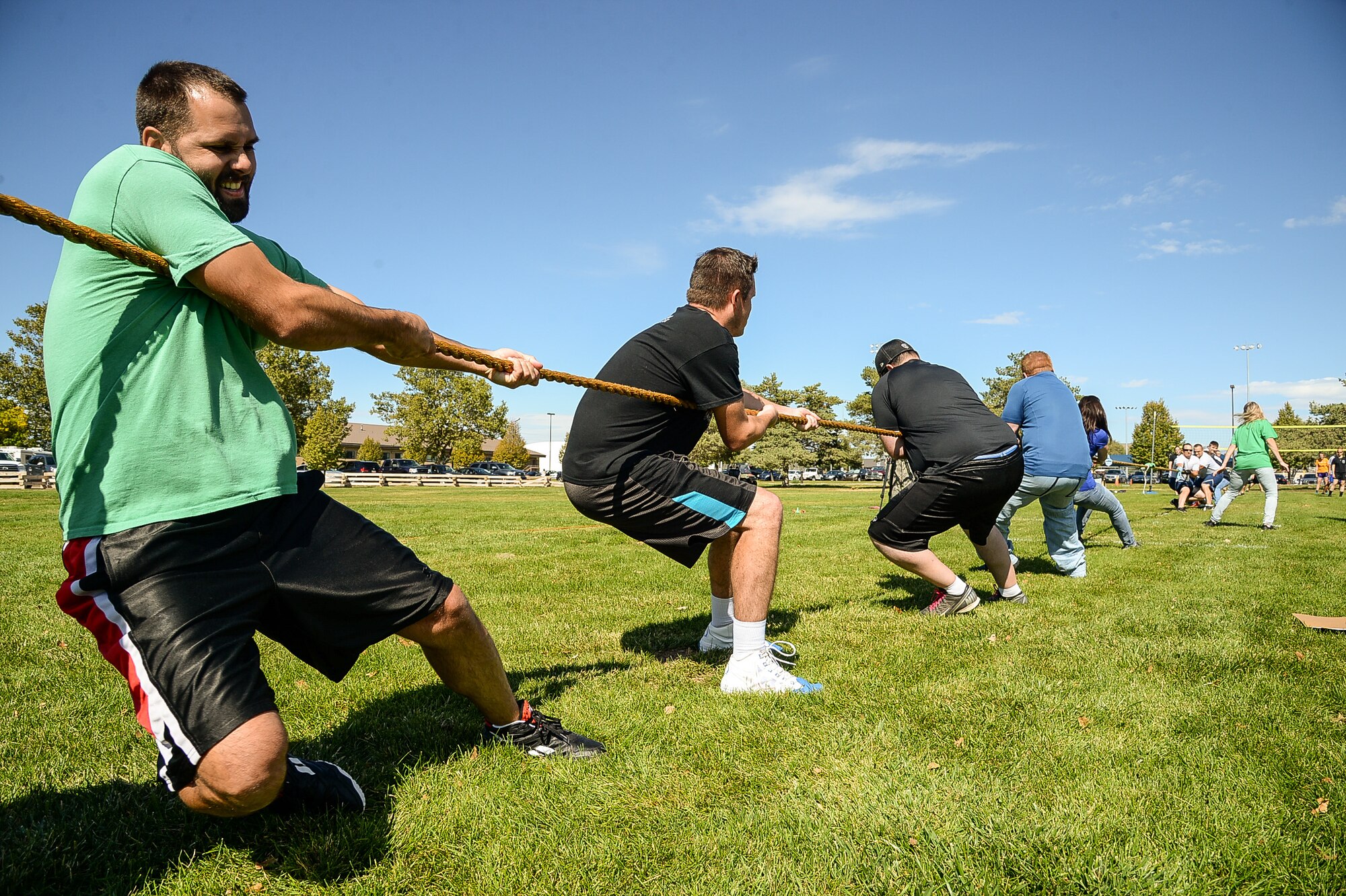 Team Hill personnel participate in a tug-o-war contest during Wingman Day Sept. 30 at Hill Air Force Base. Wingman Day is a Comprehensive Airmen Fitness initiative conducted a minimum of two times per calendar year. Its purpose is to emphasize informational awareness, accountability, and team building in the areas of mental, physical, social, and spiritual fitness.  (U.S. Air Force by R. Nial Bradshaw)