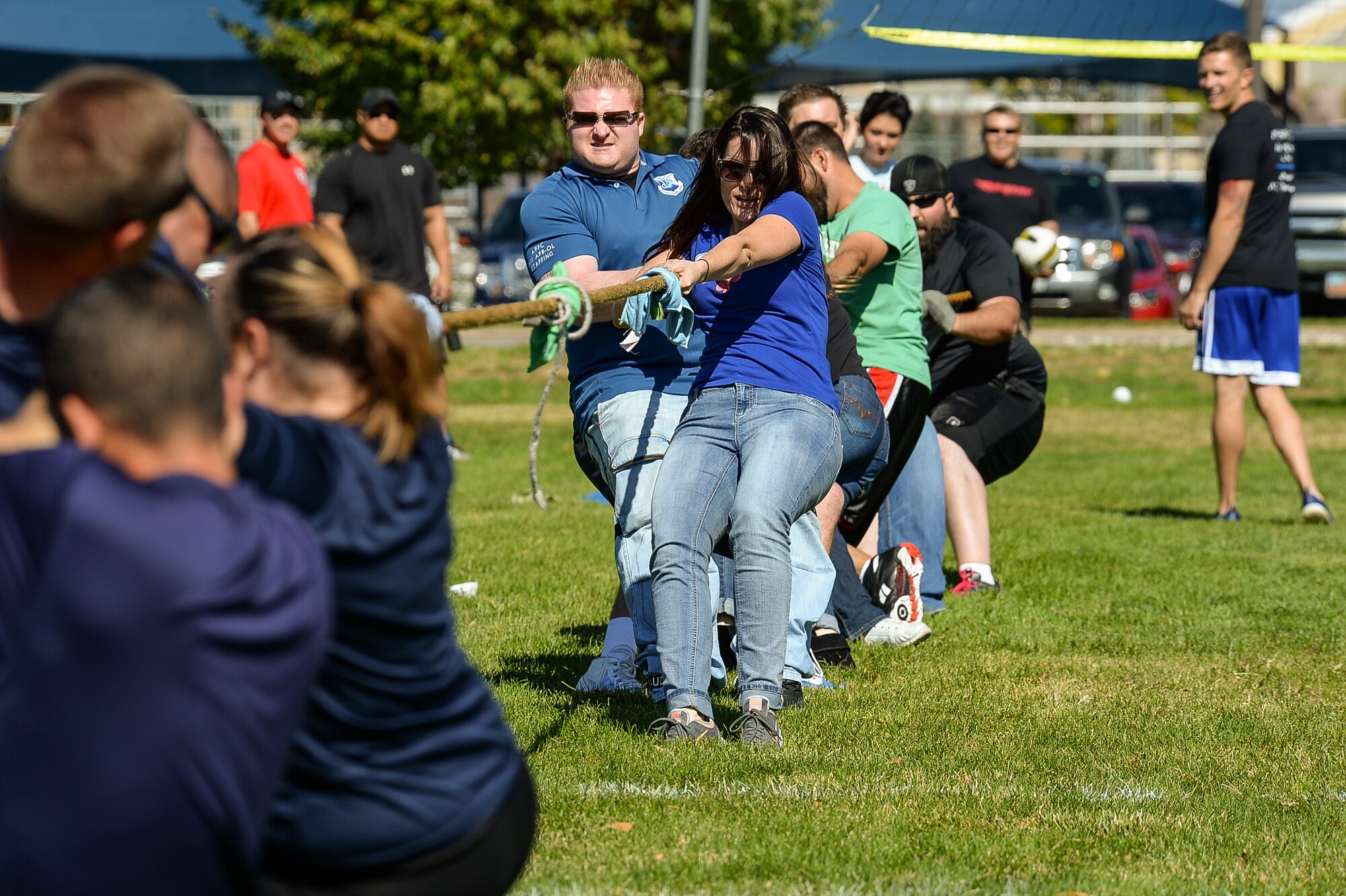 Team Hill personnel participate in a tug-of-war contest during Wingman Day Sept. 30 at Hill Air Force Base. The base’s community support coordinator and 75th Force Support Squadron, in conjunction with mission partners, coordinated a schedule of events which included unit resiliency training, lunch, basewide fitness events and team competitions, and an awards ceremony. (U.S. Air Force by R. Nial Bradshaw)