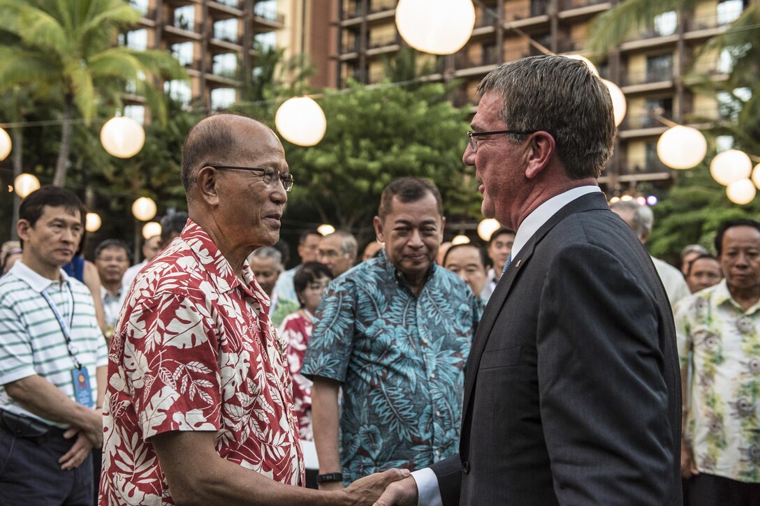 Defense Secretary Ash Carter speaks with Philippine Defense Secretary Delfin Lorenzana during a reception the day before the start of the U.S.-Association of Southeast Asian Nations defense forum Kapolei, Hawaii, Sept. 29, 2016. DoD photo by Air Force Tech. Sgt. Brigitte N. Brantley 