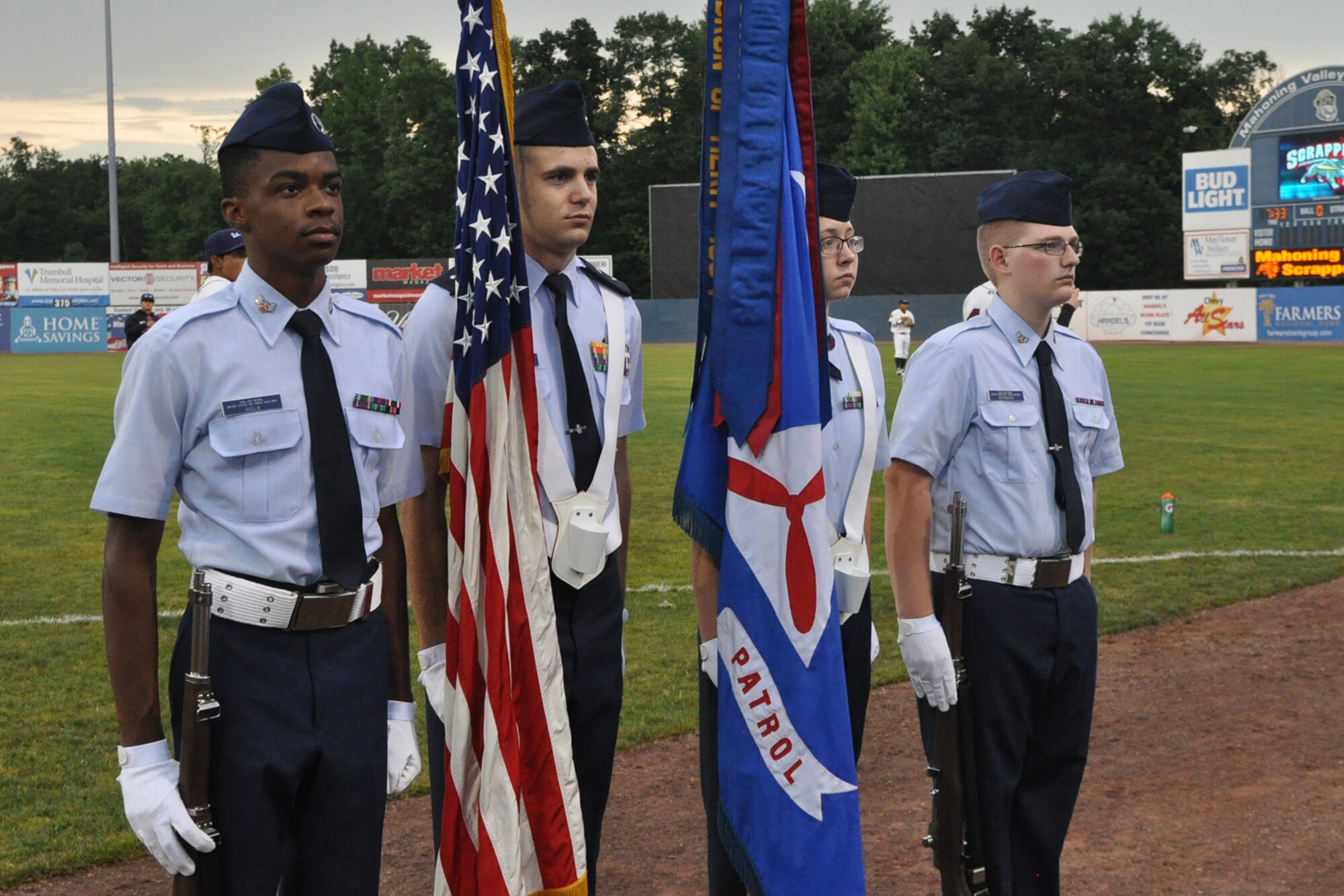 NILES, Ohio – The Youngstown Air Reserve Station Civil Air Patrol Squadron Color Guard stands at attention prior to presenting the colors during pre-game festivities for a Mahoning Valley Scrappers minor league baseball game at Eastwood Field here, August 10, 2016. A large group of the 910th Airlift Wing’s Citizen Airmen along with their families, friends and co-workers were in attendance and representatives from the 910th, also based at YARS, were involved in many game night activities for the annual YARS Night Out event where the Cleveland Indians Class A affiliate Scrappers beat the Batavia Muckdogs, 8-4. (U.S. Air Force photo/Master Sgt. Bob Barko Jr.)