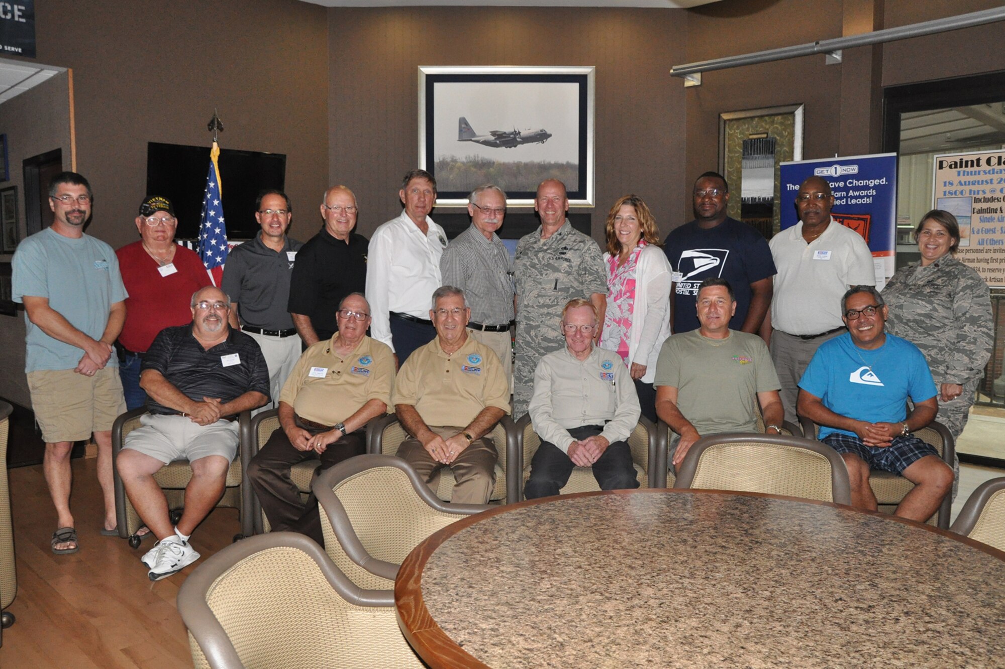 YOUNGSTOWN AIR RESERVE STATION, Ohio – The participants and their military escorts pause for a photo during the first day of the 4th Annual Joint Employer Awareness Event at the Community Activity Center here, Aug. 11, 2016. The two-day event, designed to give civilian employers of Reservists and National Guardsmen a better understanding of the mission their employees carry out as members of the U.S. Armed Forces, also gave attendees the opportunity to get an up-close look at the U.S. Coast Guard Station and U.S.S. Cod World War II Navy Submarine memorial at the Port of Cleveland as well as the 910th Airlift Wing's facilities here. (U.S. Air Force photo/Master Sgt. Bob Barko Jr.) 