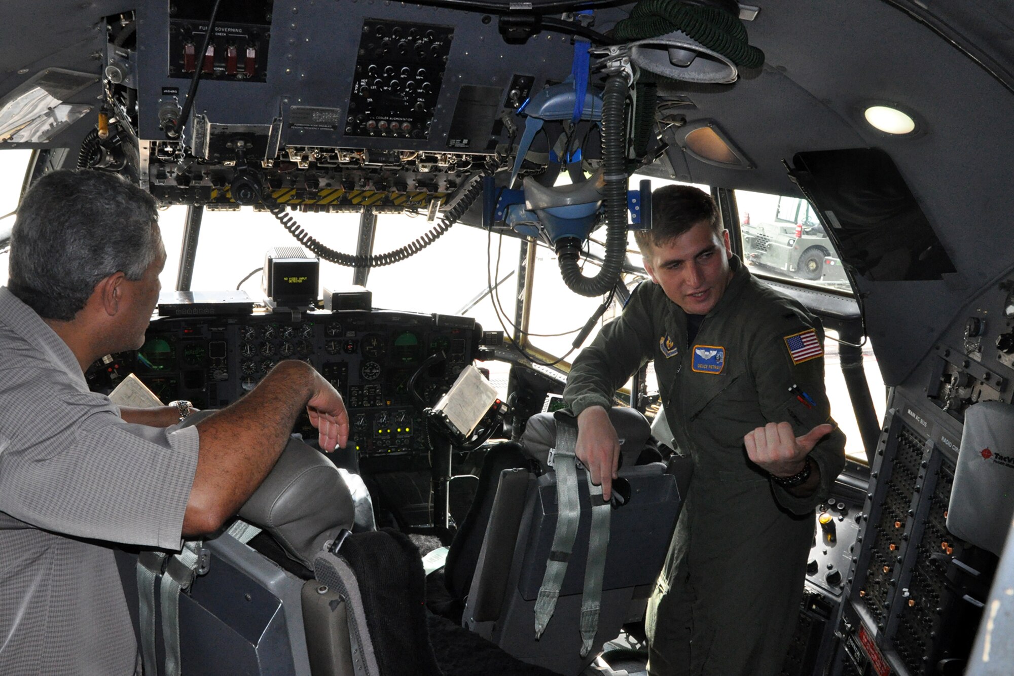 1st Lt. Kevin “Duece” Petray, a pilot assigned to the 757th Airlift Squadron, talks with an attendee on the flight deck of a C-130H Hercules tactical cargo transport aircraft during the 4th Annual Joint Employer Awareness Event here, Aug. 12, 2016. The two-day event, designed to give civilian employers of Reservists and National Guardsmen a better understanding of the mission their employees carry out as members of the U.S. Armed Forces, also gave attendees the opportunity to get an up-close look at the U.S. Coast Guard Station and U.S.S. Cod World War II Navy Submarine memorial at the Port of Cleveland as well as the 910th Airlift Wing's facilities here. (U.S. Air Force photo/Master Sgt. Bob Barko Jr.)