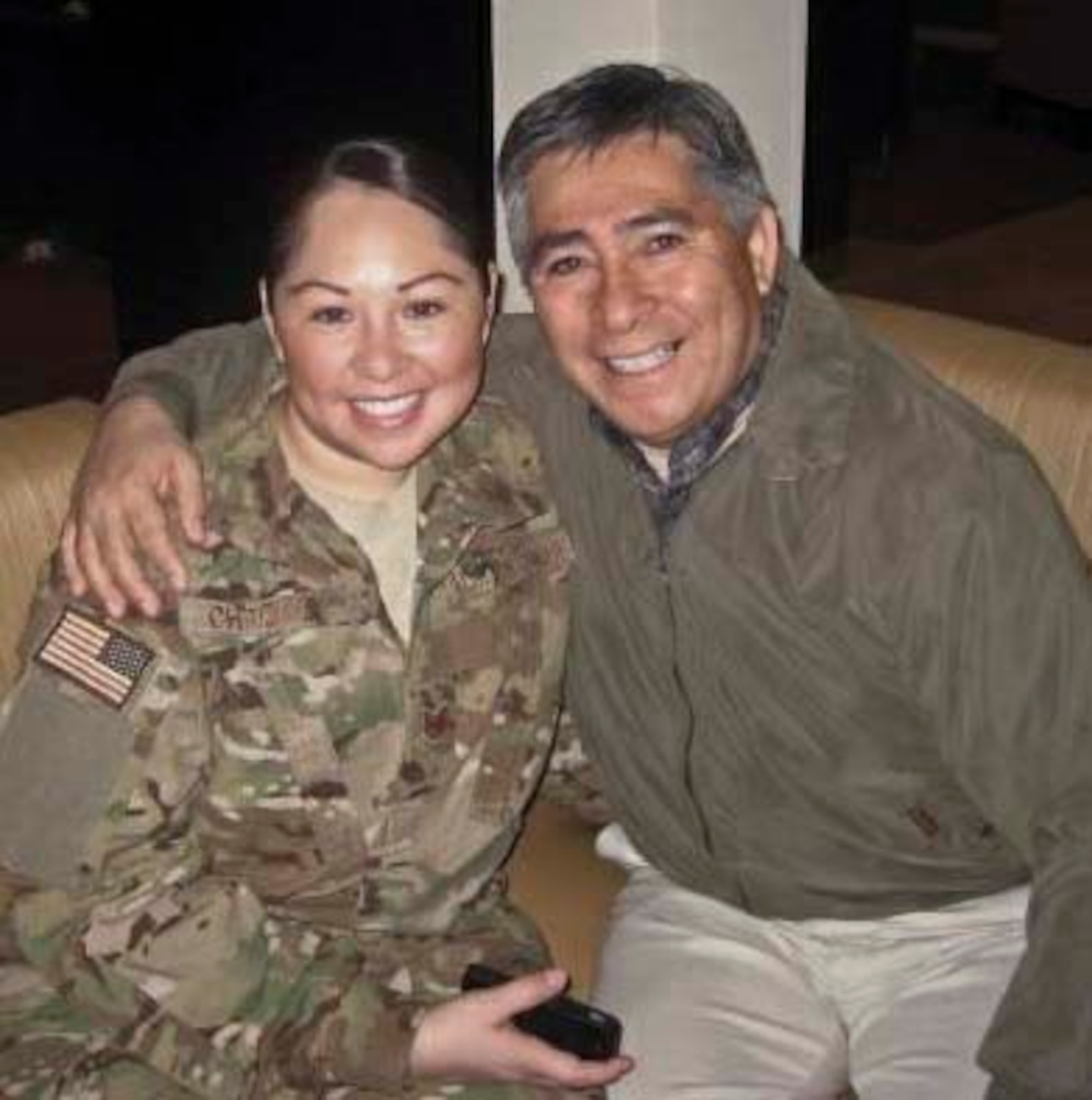 Tech. Sgt. Evelyn Chromey, NCO in charge of personal property with the 6th Logistics Readiness Squadron, is seen here with her father who once served in the Peruvian air force. She credits her strict upbringing to him, which helped her make a smooth transition into the U.S. Air Force lifestyle. (Courtesy photo)