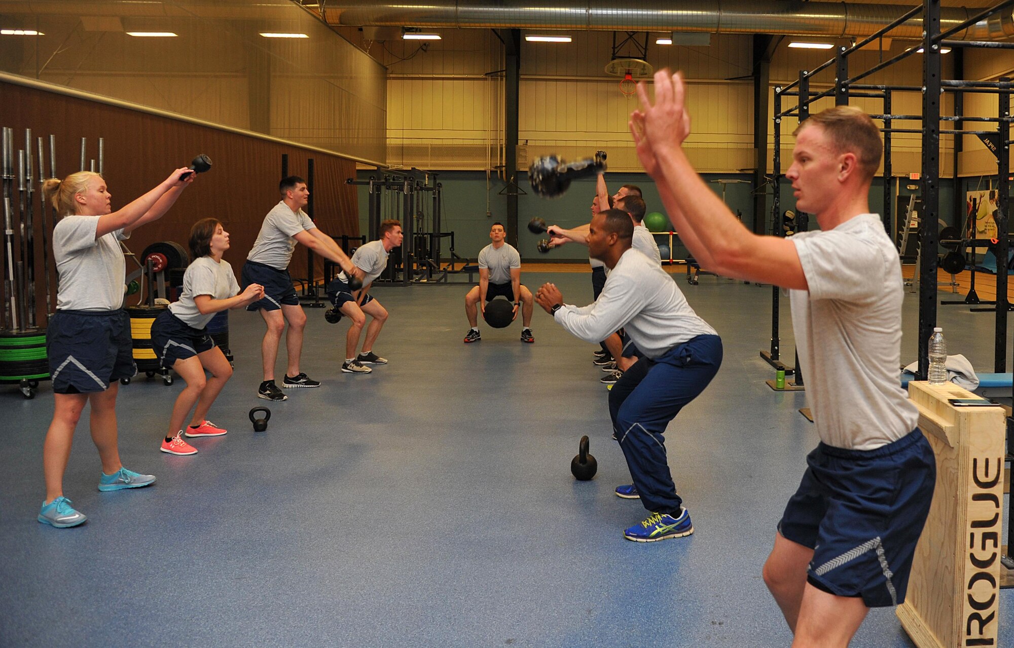 319th Force Support Squadron Honor Guardsmen exercise as a unit on Grand Forks Air Force Base, N.D. Sept. 28. “It is a team effort, everyone is pushing every single person in the Honor Guard unit or even if we have people join our workouts, we are always going to push everyone to finish,” said Senior Airman Charles Farber, 319th FSS Honor Guard Flight Leader. (U.S. Air Force photo by Airman 1st Class Elijaih Tiggs)