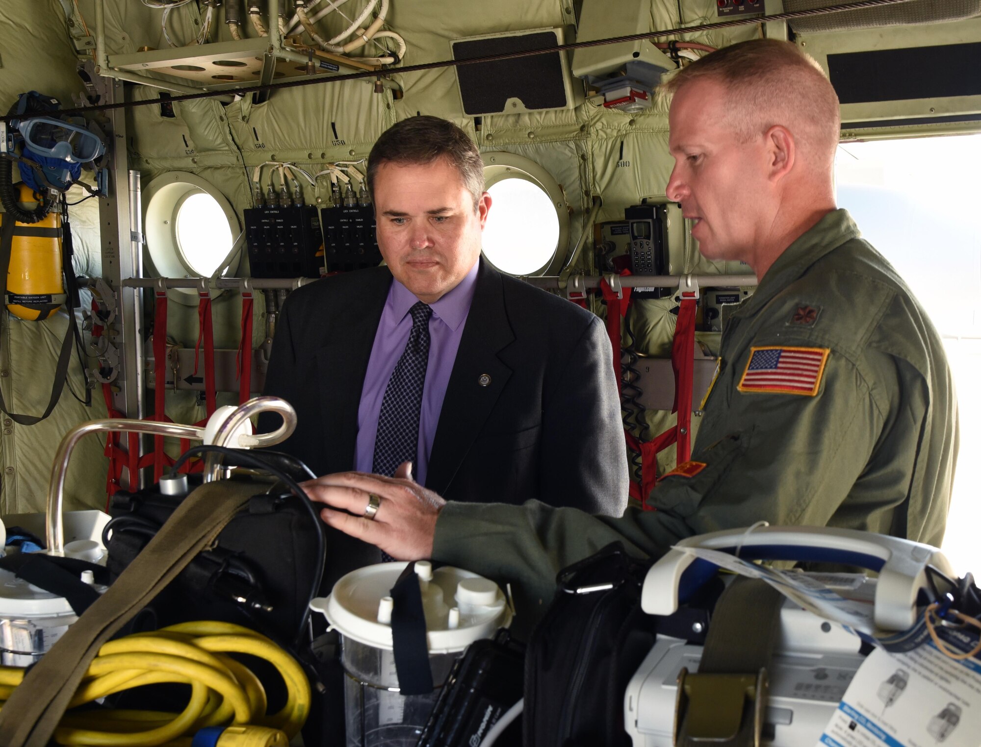 Maj. Robert Hector, 36th Aeromedical Evacuation Squadron, explains the AE mission to John "Hoss" Ladner, military and veterans outreach director for Mississippi Congressman Steven Palazzo, during a tour of the 403rd Wing Sept. 27, 2016. The wing gained the 36th AES Oct. 1, 2016, and is having a ceremony welcoming the new unit during the Unit Training Assembly Oct. 15, 2016.  (U.S. Air Force photo/Maj. Marnee A.C. Losurdo) 