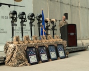 Master Sgt. Johnathon Maurer, 455th Expeditionary Security Forces Squadron first sergeant, reads off the names of those airmen lost during the mishap of Torque 62, Bagram Airfield, Afghanistan, Oct. 2. Among those remembered were Hanscom Senior Airmen Kcey Ruiz and Nathan Sartain, as well as Capt. Jordan Pierson, Capt. Jonathan Golden, Staff Sgt. Ryan Hammond and Senior Airman Quinn Johnson-Harris. Airmen from the 455th AEW gathered to remember the six Airmen and five contractors lost when Torque 62 crashed Oct. 2, 2015. (U.S. Air Force photo by Capt. Korey Fratini)