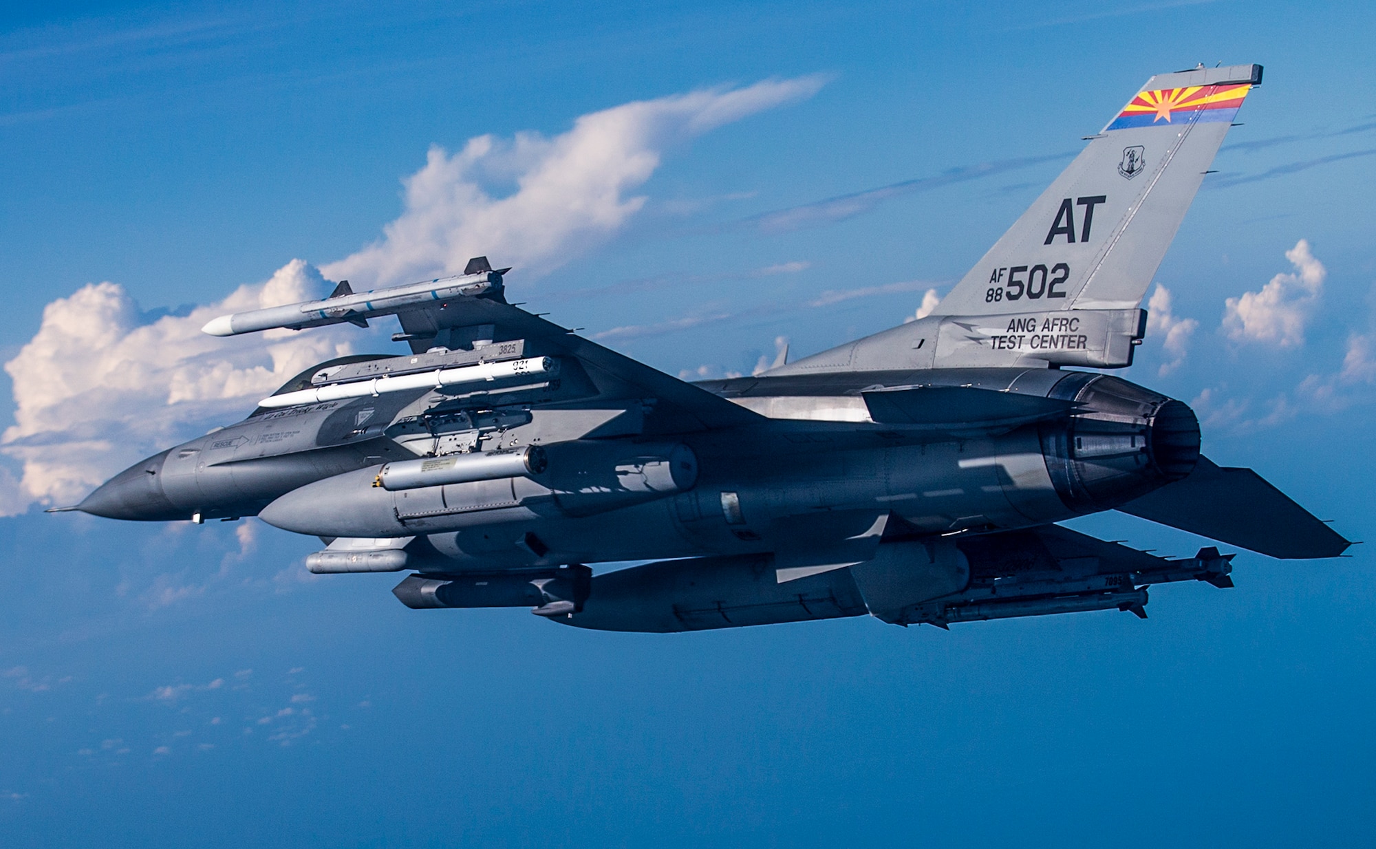 An F-16 from the Arizona Air National Guard Air Reserve Test Center prepares to fire M151 warhead rounds integrated with the Advanced Precision Kill Weapon System II over the Eglin Air Force Base range in July. The system turns existing Hydra 70 unguided rockets into precision guided munitions through the addition of a laser guidance kit. The Arizona Air National Guard Air Reserve Test Center worked with the 96th Test Wing community on the tests. (Courtesy Photo)