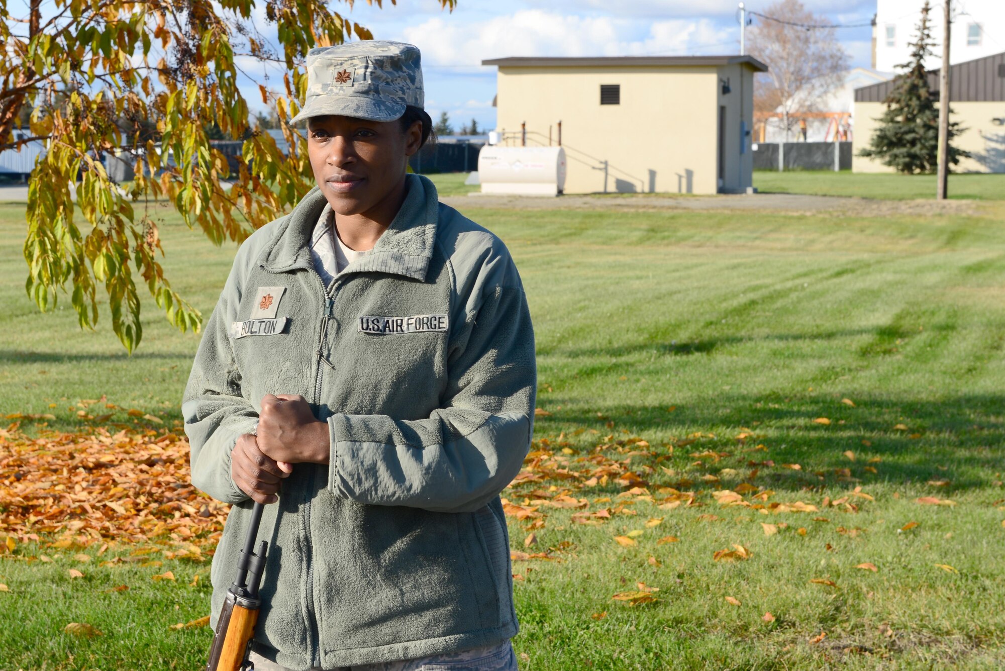 U.S. Air Force Maj. Shellonda Bolton, the 354th Comptroller Squadron commander, learns how to hold a rifle for a funeral detail Sept. 26, 2016, at Eielson Air Force Base, Alaska. Bolton was one of many participants who joined the Eielson Honor Guard in a job shadowing event where the team demonstrated and taught commanders and squadron leadership what they train for on a daily basis. (U.S. Air Force photo by Airman 1st Class Cassandra Whitman)