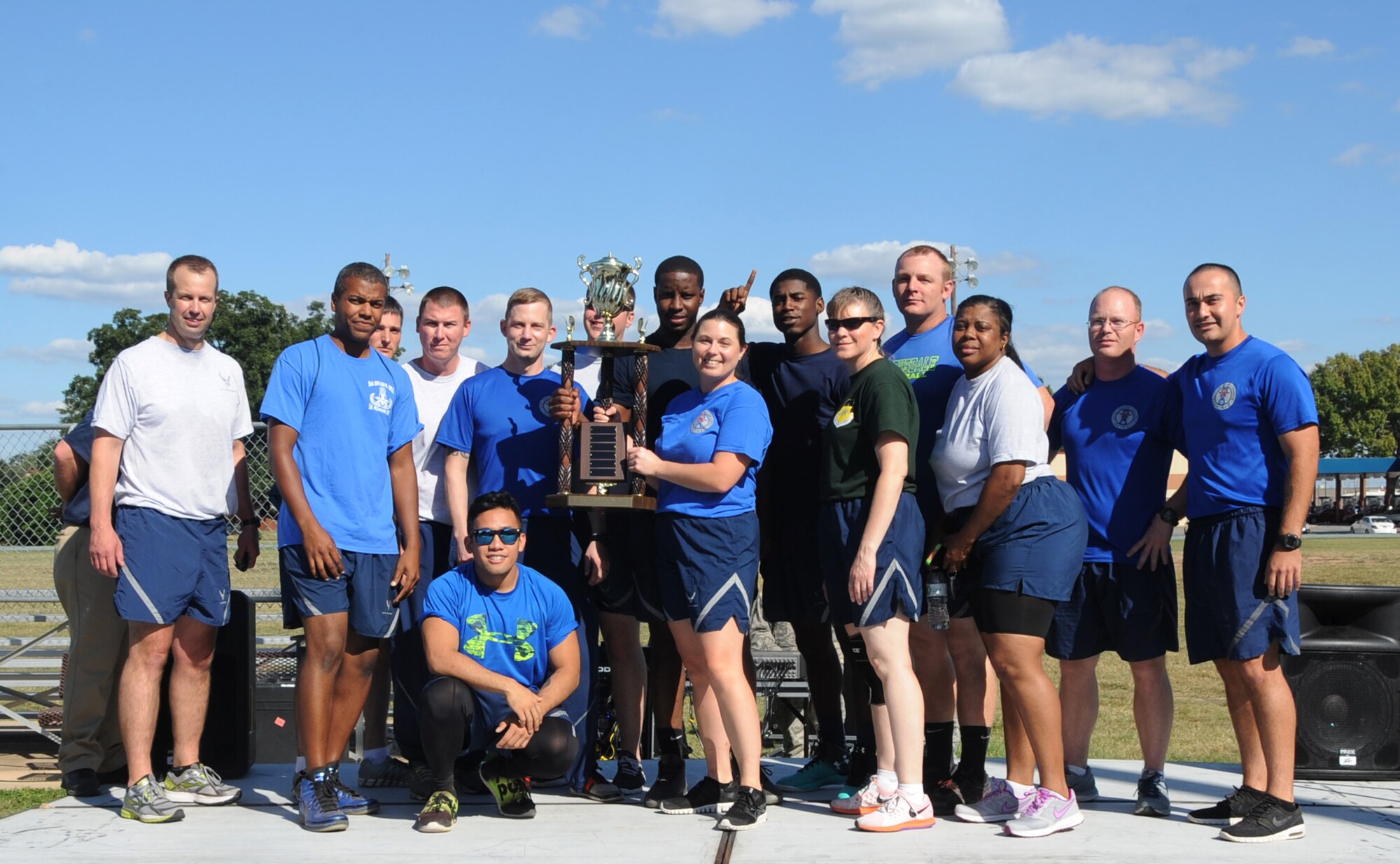 2nd Civil Engineer Squadron Airmen pose for a photo after being awarded first place at Barksdale Air Force Base, La., Sept. 30, 2016. Throughout the day, Airmen earned points for their squadrons by participating in various sporting events. (U.S. Air Force photo/Airman Alexis Schultz)
