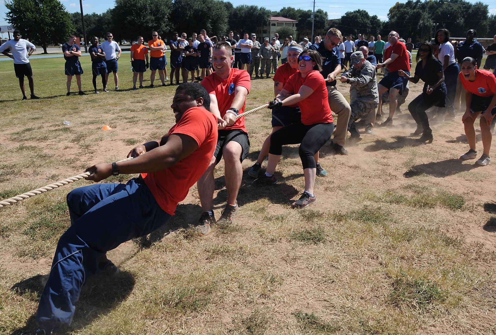 2nd Force Support Squadron Airmen compete in a tug-of-war match during sports day at Barksdale Air Force Base, La., Sept. 30, 2016. The day was designed to expand awareness of fitness and sports programs, while improving teamwork and boosting morale. (U.S. Air Force photo/Airman Alexis Schultz)
