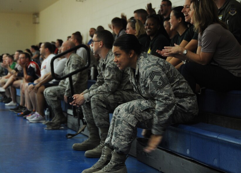 Chief Master Sgt. Angelique McDonald, Air Force Global Strike Command Public Affairs functional manager, cheers during the colonels versus chiefs volleyball match during sports day at Barksdale Air Force Base, La., Sept. 30, 2016. Throughout the day, Airmen participated in various team-sporting events ranging from bowling to tug-of-war, earning points for their squadron. (U.S. Air Force photo/Airman Alexis Schultz)