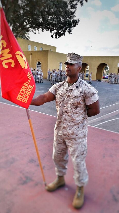 GySgt Christopher Collins who is attending Recruiters Schools Career Recruiter Course is holding the Guidon for the morning promotion formation. GySgt Collins is from the 6th Marine Corps District, Recruiting Station Baton Rouge. 