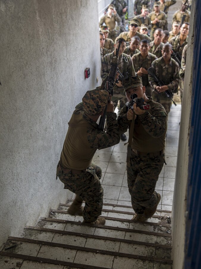 TARAVAO, Tahiti – U.S. Marine Lance Cpl. Cory Walters, left, a combat engineer with Combat Engineer Platoon and Cpl. Calloway, a rifleman with Combat Engineer platoon, Task Forces Koa Moana 16-4, clear a stairway during urban operations training in Taravao, Tahiti, Sept. 23, 2016. American and French forces worked together to build partnership and learn from each other’s tactics. (U.S. Marine Corps photo by Lance Cpl. Quavaungh Pointer)