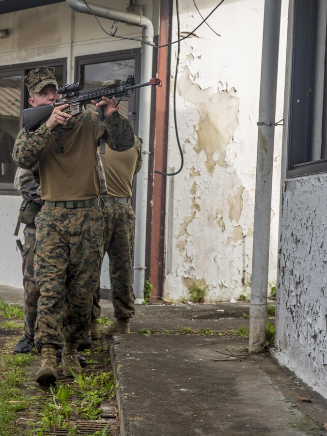 TARAVAO, Tahiti – U.S. Marine Lance Cpl. Cory Walters, a team leader with Combat Engineer Platoon, Task Forces Koa Moana 16-4, leads his fire team on a patrol during urban operations training in Taravao, Tahiti, Sept. 23, 2016. American and French forces worked together to build partnership and learn from each other’s tactics. (U.S. Marine Corps photo by Lance Cpl. Quavaungh Pointer)
