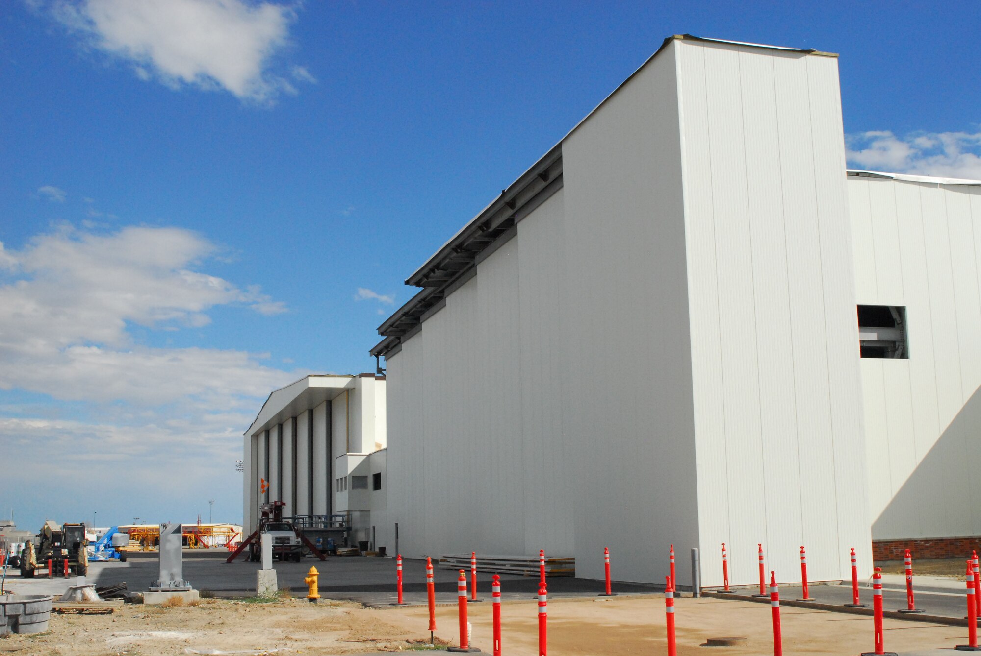 Construction on the 120th Airlift Wing’s new corrosion control hanger, foreground, and the remodel of the unit’s maintenance hangar is nearing completion. The hangar is scheduled to be completed in November, but the corrosion control hangar will not be completed until February 2017. (U.S. Air National Guard photo by Tech. Sgt. Michael Touchette)
