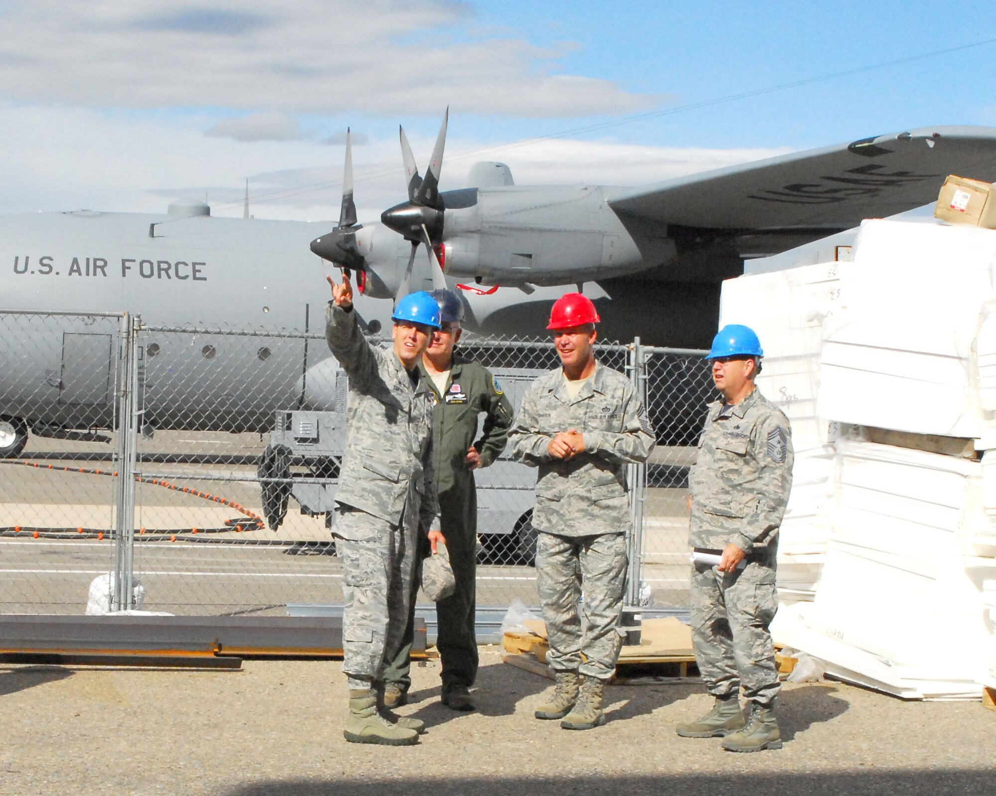 Officials from the Montana Air National Guard observe the progress of the construction projects being completed at the Montana Air National Guard base at the Great Falls International Airport. The facilities will provide maintenance personnel a consolidated place in which to conduct scheduled maintenance activities. (U.S. Air National Guard photo by Tech. Sgt. Michael Touchette)
