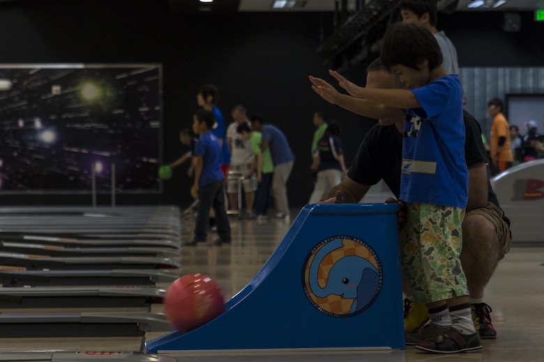 An athlete competes in a bowling competition during the Special Olympics Nippon Hiroshima at Marine Corps Air Station Iwakuni, Japan, Oct. 2, 2016. Activities held at the Special Olympics included basketball, futsal, tennis, bowling and a duathlon. The Special Olympics instills confidence, inspires a sense of competition and improves health through the transformative power of sports for children and adults with mental and learning disabilities. (U.S. Marine Corps photo by Lance Cpl. Aaron Henson)