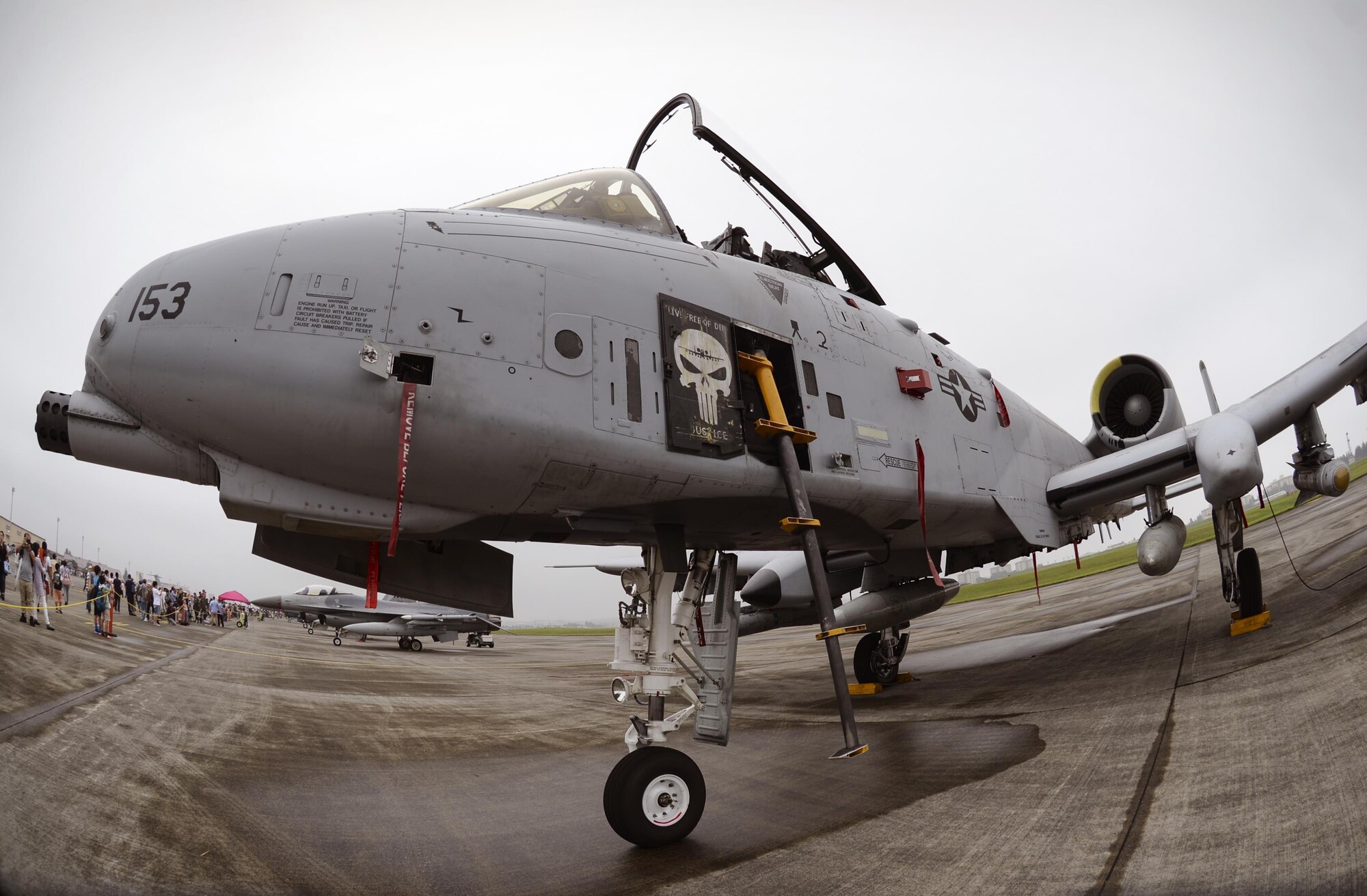 An A-10 Warthog is displayed on the flight line during the 2016 Japanese-American Friendship Festival at Yokota Air Base, Japan, Sept. 17, 2016. Tens of thousands of people attend the festival every year to learn more about the US military and American culture. (U.S. Air Force photo by Airman 1st Class Elizabeth Baker/Released)