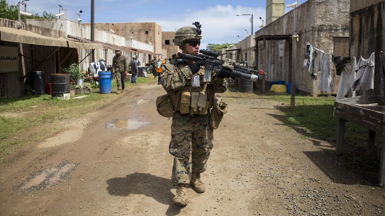 Lance Cpl. Justin Rumphrey, a team leader with Charlie Company, 1st Battalion, 3rd Marine Regiment, and a Loganville, Georgia native, patrols through a simulated village during Exercise Island Viper aboard Marine Corps Training Area Bellows, Sept. 29, 2016. Exercise Island Viper is a 3-week-long battalion level training evolution workup that focuses on sharpening the infantry skills of the individual, team and squad.